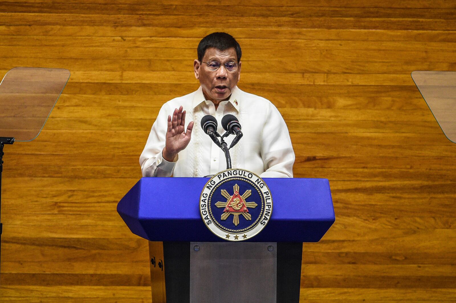 FILE - Philippine President Rodrigo Duterte gestures as he delivers his final State of the Nation Address at the House of Representatives in Quezon City, Philippines on July 26, 2021. (Jam Sta Rosa/Pool Photo via AP, File)