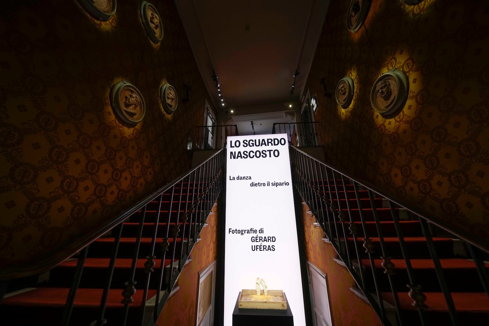 The entrance of the La Scala Opera House is seen during the unveiling of the photo exhibition 'Lo sguardo nascosto' ( The hidden gaze) by photographer Gerard Uferas, in Milan, Italy, Tuesday, Feb. 11, 2025. (AP Photo/Luca Bruno)