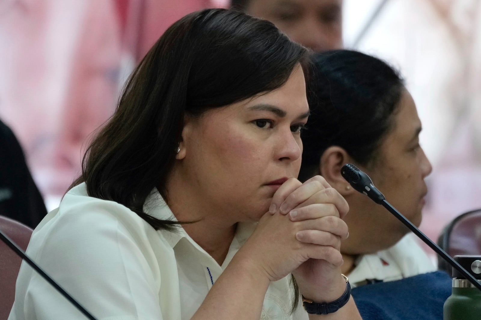 Philippine Vice President Sara Duterte listens as she attends a hearing at the House of Representative in Quezon City, Philippines on Monday Nov. 25, 2024. (AP Photo/Aaron Favila)