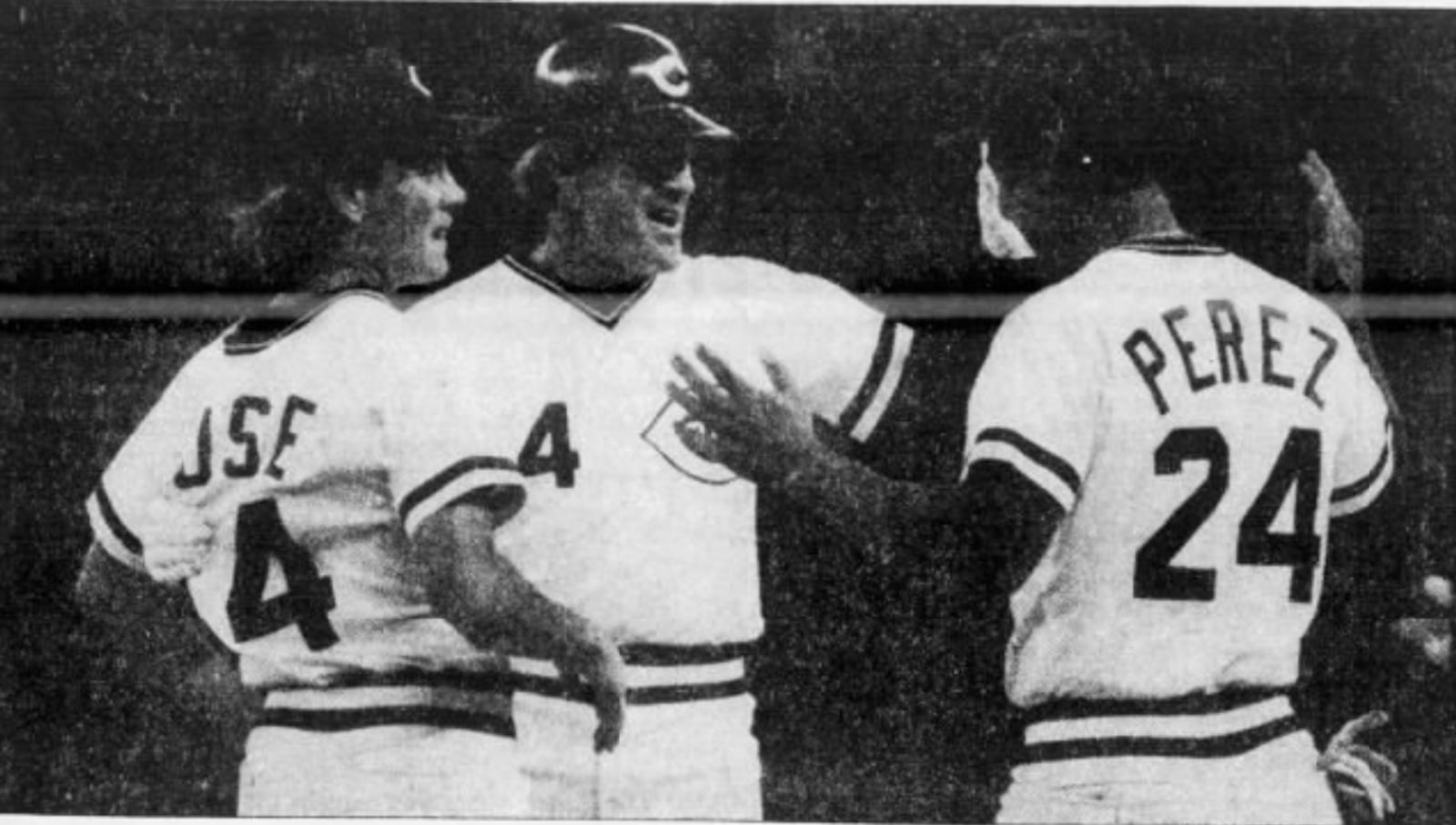 Pete Rose celebrates with Pete Rose Jr., left, and Tony Perez after his record-breaking 4,192nd hit on Sept. 11, 1985, at Riverfront Stadium in Cincinnati. Dayton Daily News photo by Ty Greenlees