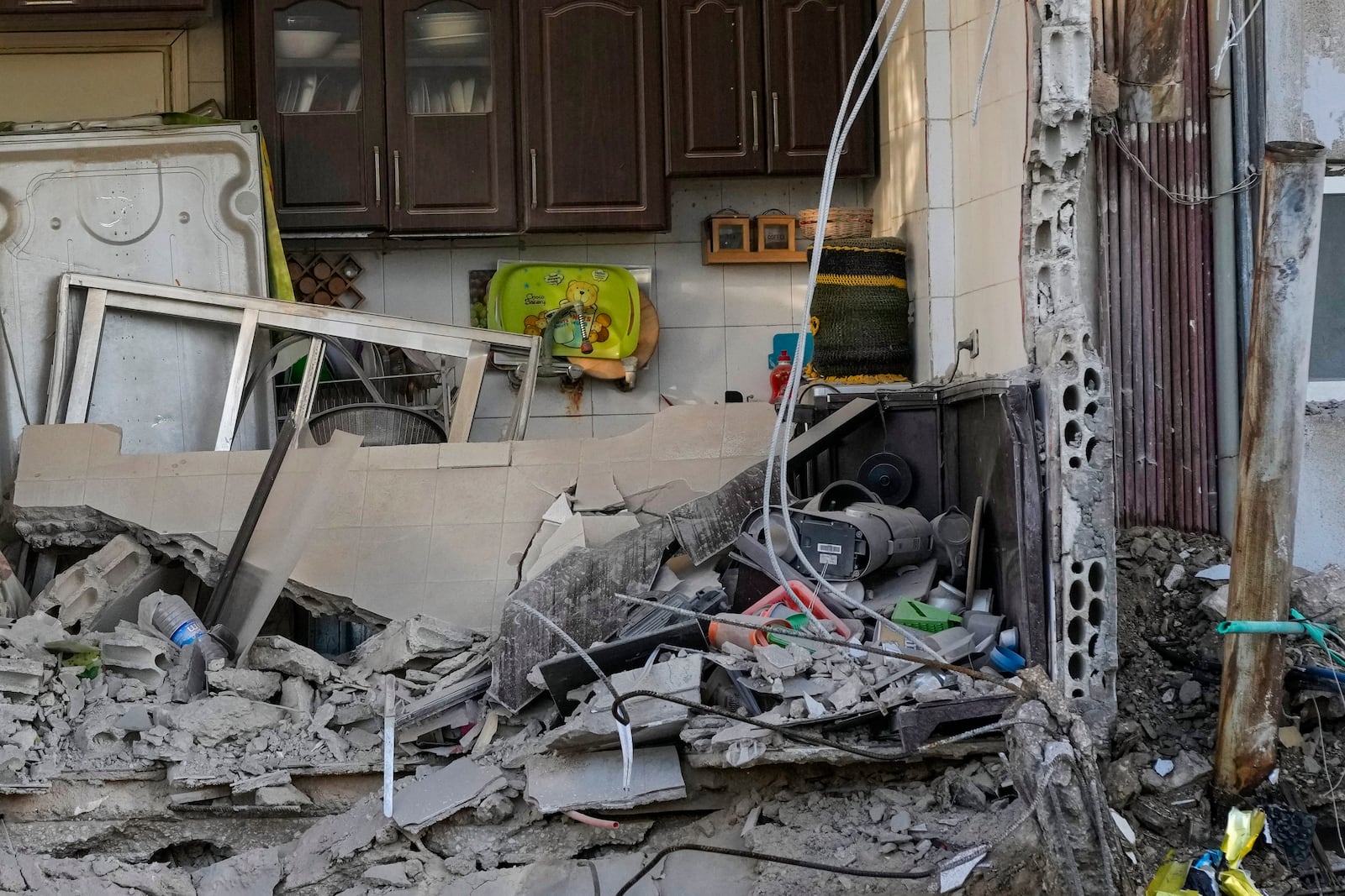 A destroyed apartment at the site of an Israeli airstrike in Dahiyeh, Beirut, Lebanon, Monday, Oct. 21, 2024. (AP Photo/Hassan Ammar)