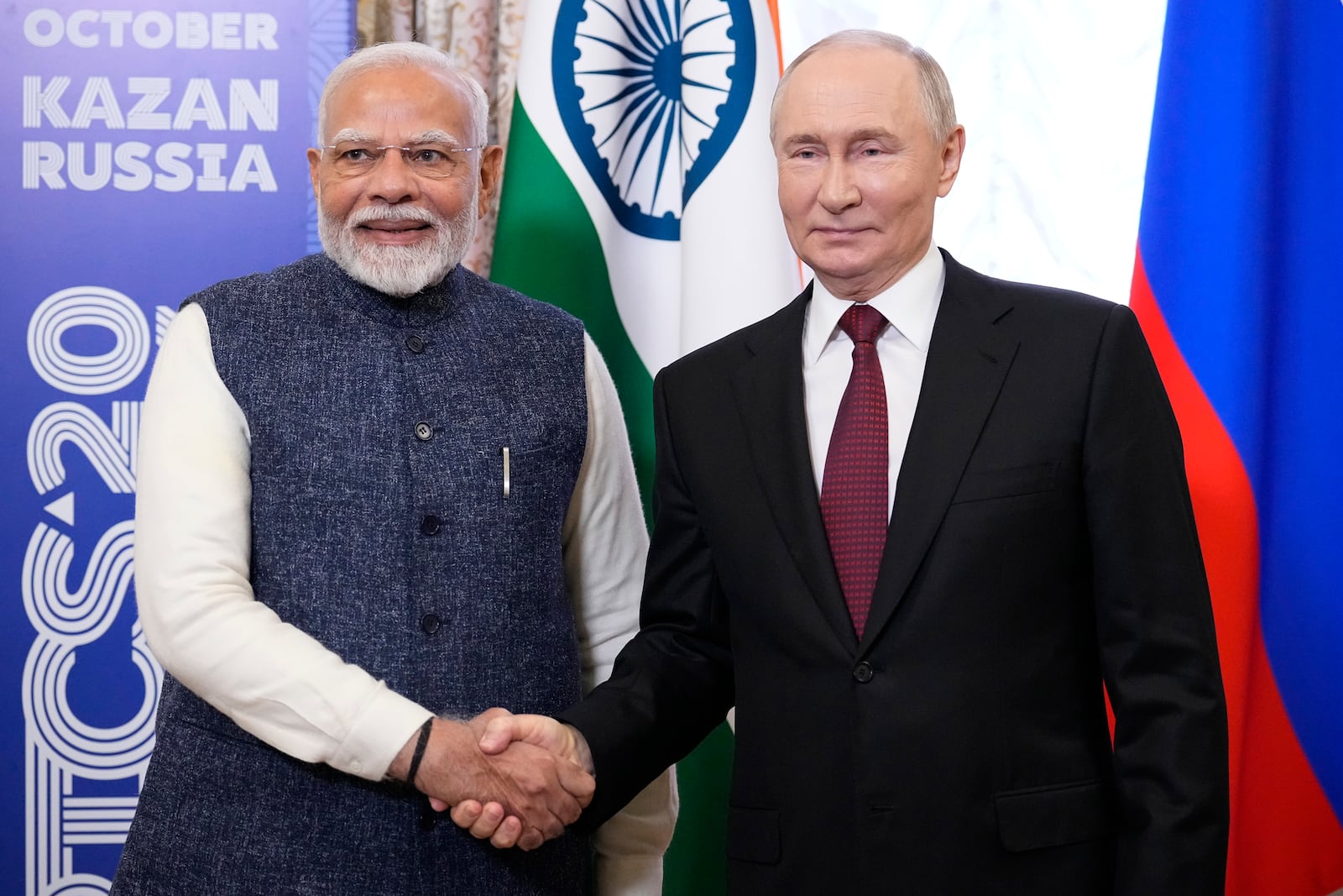 FIL E- Russian President Vladimir Putin, right, and Indian Prime Minister Narendra Modi shake hands during their meeting on the sidelines of BRICS Summit at Kazan Kremlin in Kazan, Russia, on Oct. 22, 2024. (AP Photo/Alexander Zemlianichenko, Pool, File)