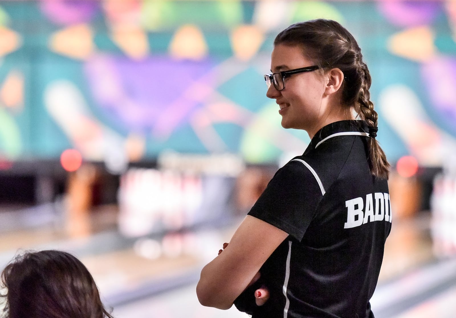 Badin’s Claire Stiens waits her turn Thursday during the Division II district bowling tournament at Beaver-Vu Bowl in Beavercreek. NICK GRAHAM/STAFF