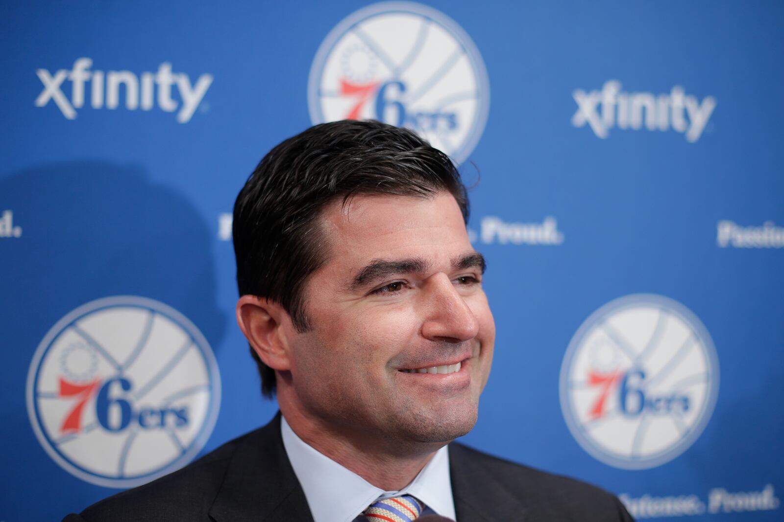 FILE - Philadelphia 76ers chief executive officer Scott O'Neil speaks to reporters at the team's NBA basketball training facility, Monday, July 8, 2013, in Philadelphia. (AP Photo/Matt Rourke, File)