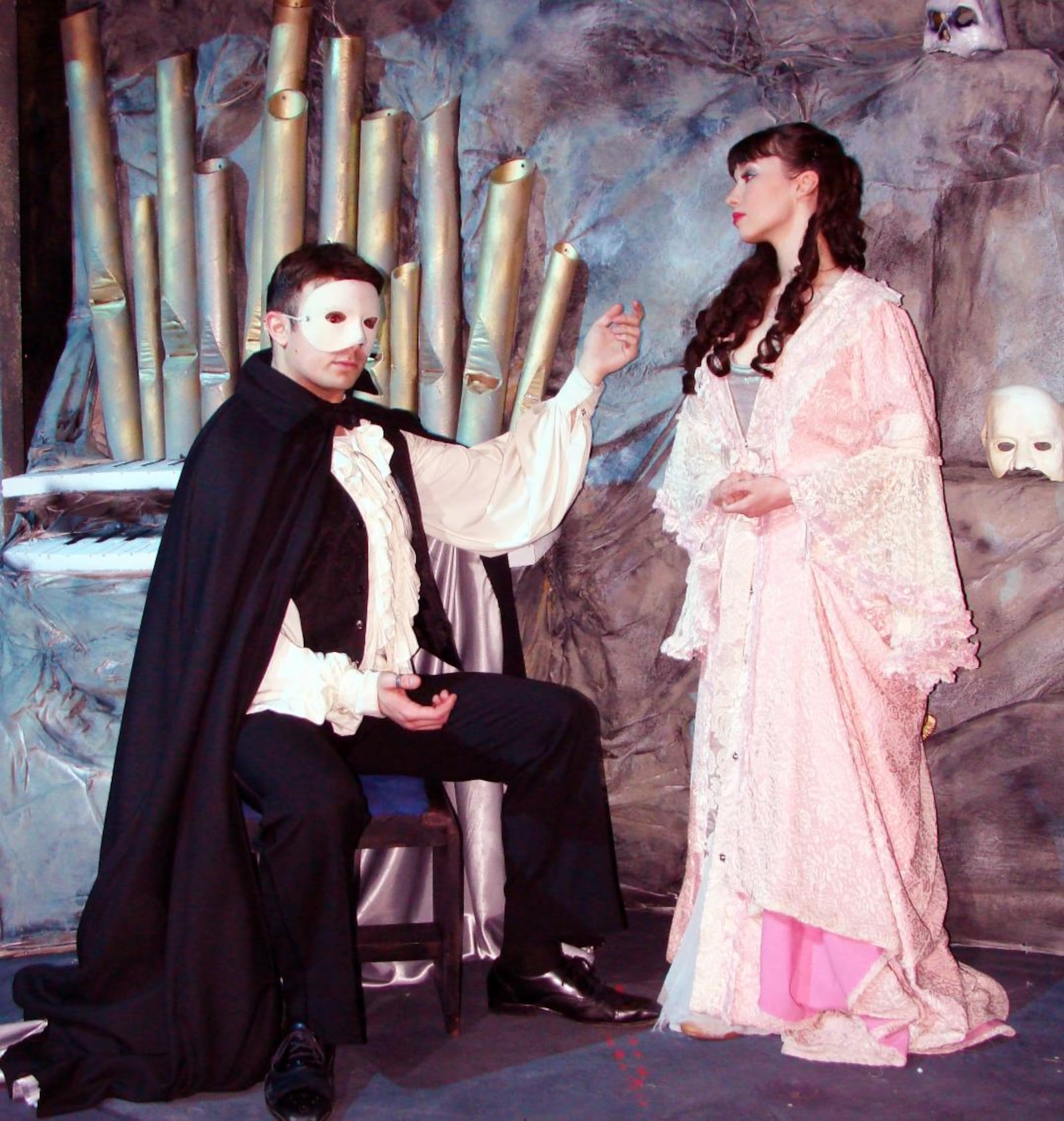 Matthew Wade (Phantom/Erik) and Lily Autumn Page (Christine) in La Comedia Dinner Theatre's production of "Phantom," presented Feb. 17-April 3, 2022. PHOTO BY JUSTIN WALTON