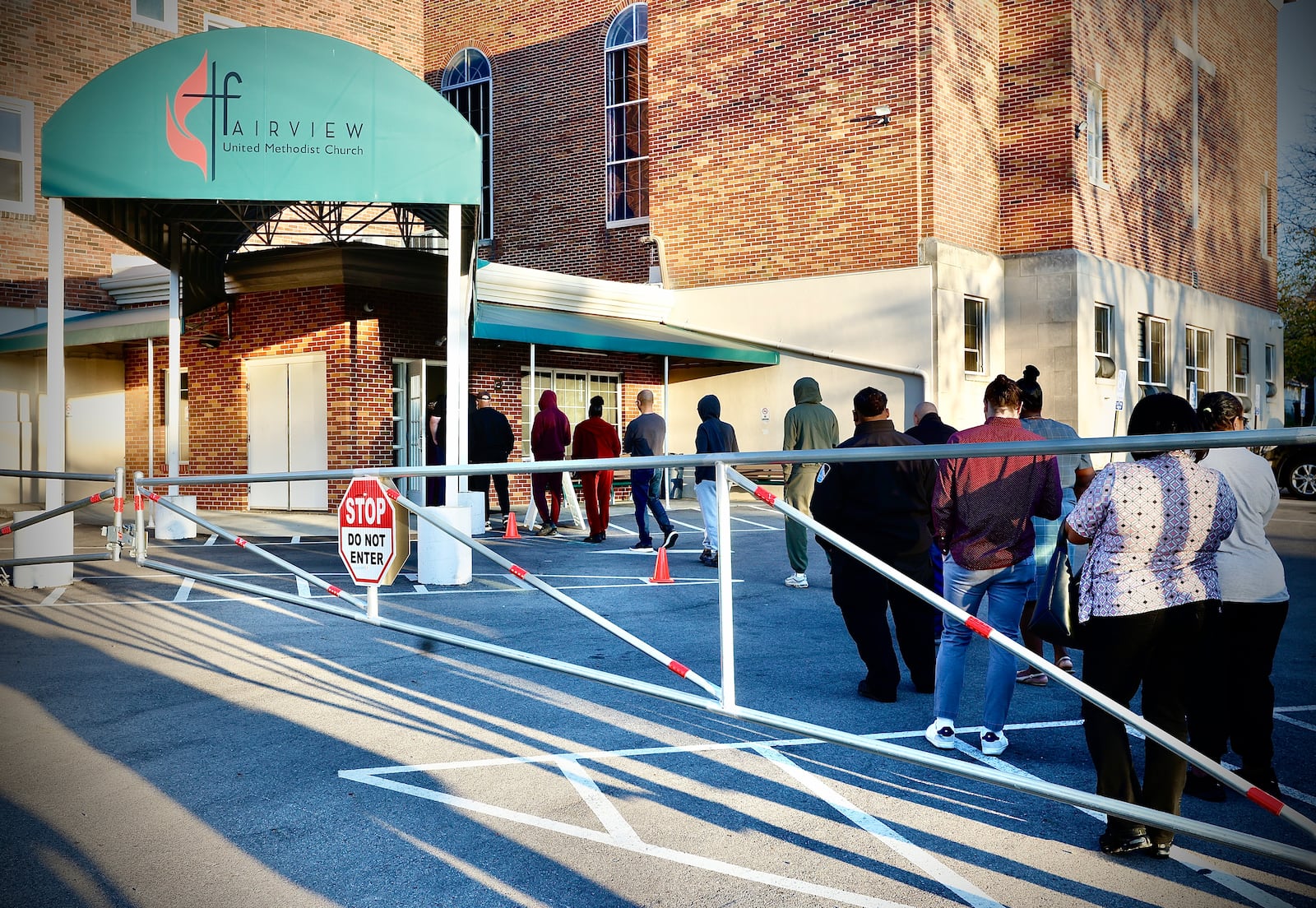 Voters wait in line at Fairview United Methodist Church in Dayton to cast their votes on Tuesday, Nov. 5, 2024. MARSHALL GORBY\STAFF