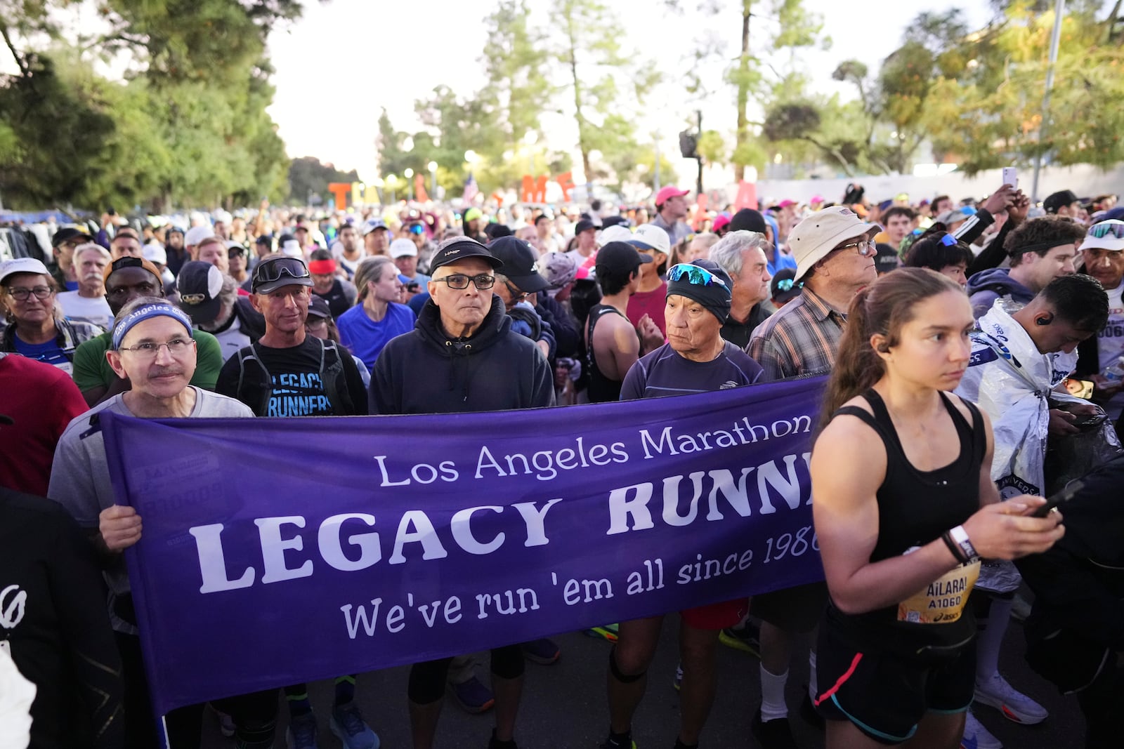 Members of the Legacy Runners gather at the start of the Los Angeles Marathon Sunday, March 16, 2025, in Los Angeles. (AP Photo/Eric Thayer)