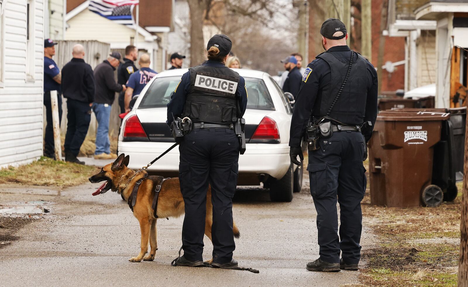 Middletown police searched for a suspect who took off on foot after crashing a vehicle through a garage on Tytus Avenue Feb. 9, 2023. The suspect was being sought in connection to an unknown case. NICK GRAHAM/STAFF