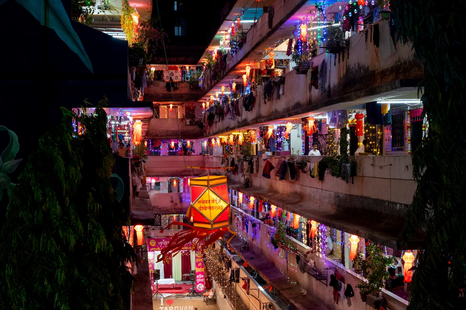 FILE- A residential building is decorated with lanterns and lights during Diwali, the festival of lights in Mumbai, India, Nov. 12, 2023. (AP Photo/Rafiq Maqbool, File)