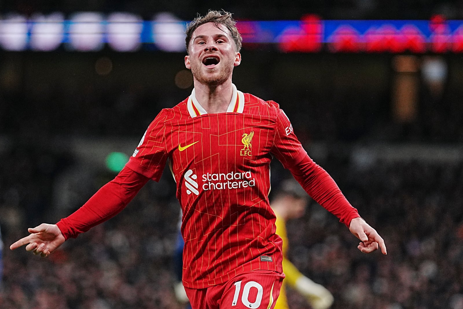 Liverpool's Alexis Mac Allister celebrates after scoring his side's second goal during the English Premier League soccer match between Tottenham and Liverpool at Tottenham Hotspur Stadium in London, Sunday, Dec. 22, 2024. (AP Photo/Dave Shopland)