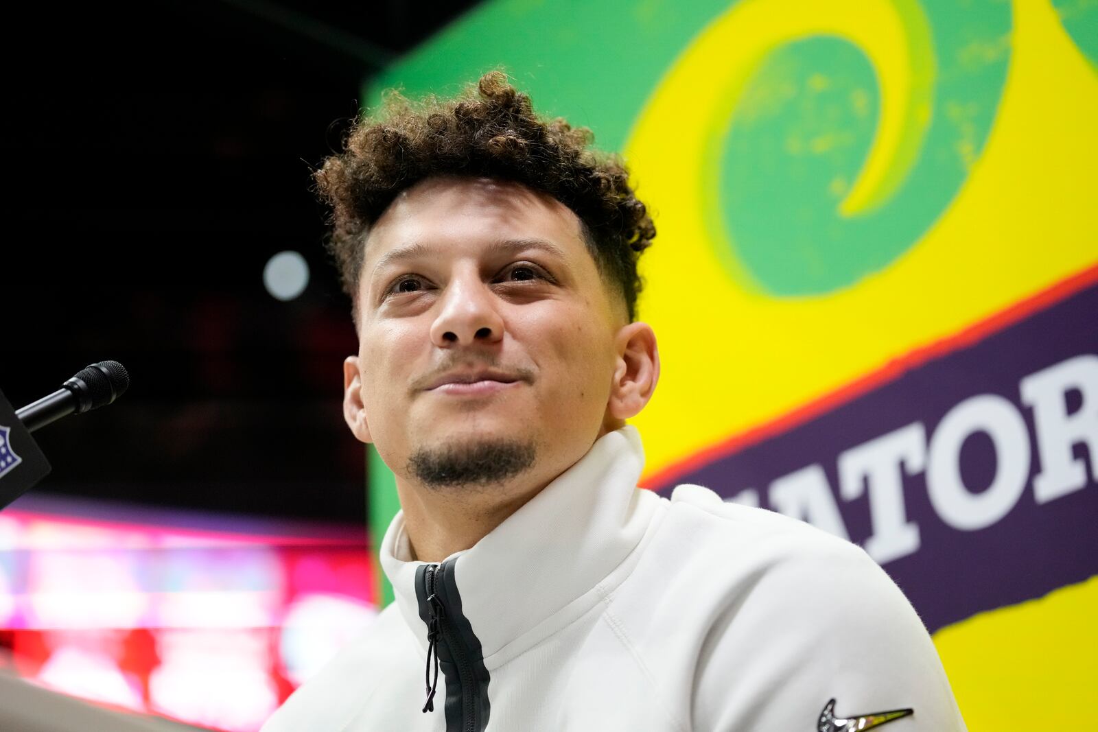 Kansas City Chiefs quarterback Patrick Mahomes (15) participates during Super Bowl 59 Opening Night, Monday, Feb. 3, 2025, in New Orleans, ahead of the NFL football game between the Philadelphia Eagles and the Kansas City Chiefs Sunday. (AP Photo/Brynn Anderson )