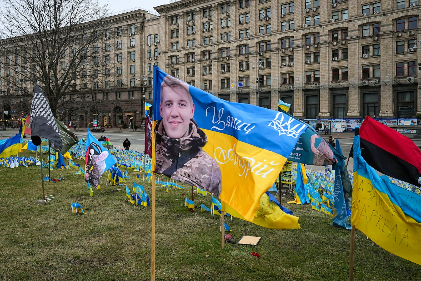 Flags wave at the memorial site for those killed during the war, in Independence Square in Kyiv, Ukraine, Saturday, Feb. 24, 2024. (AP Photo/Efrem Lukatsky)