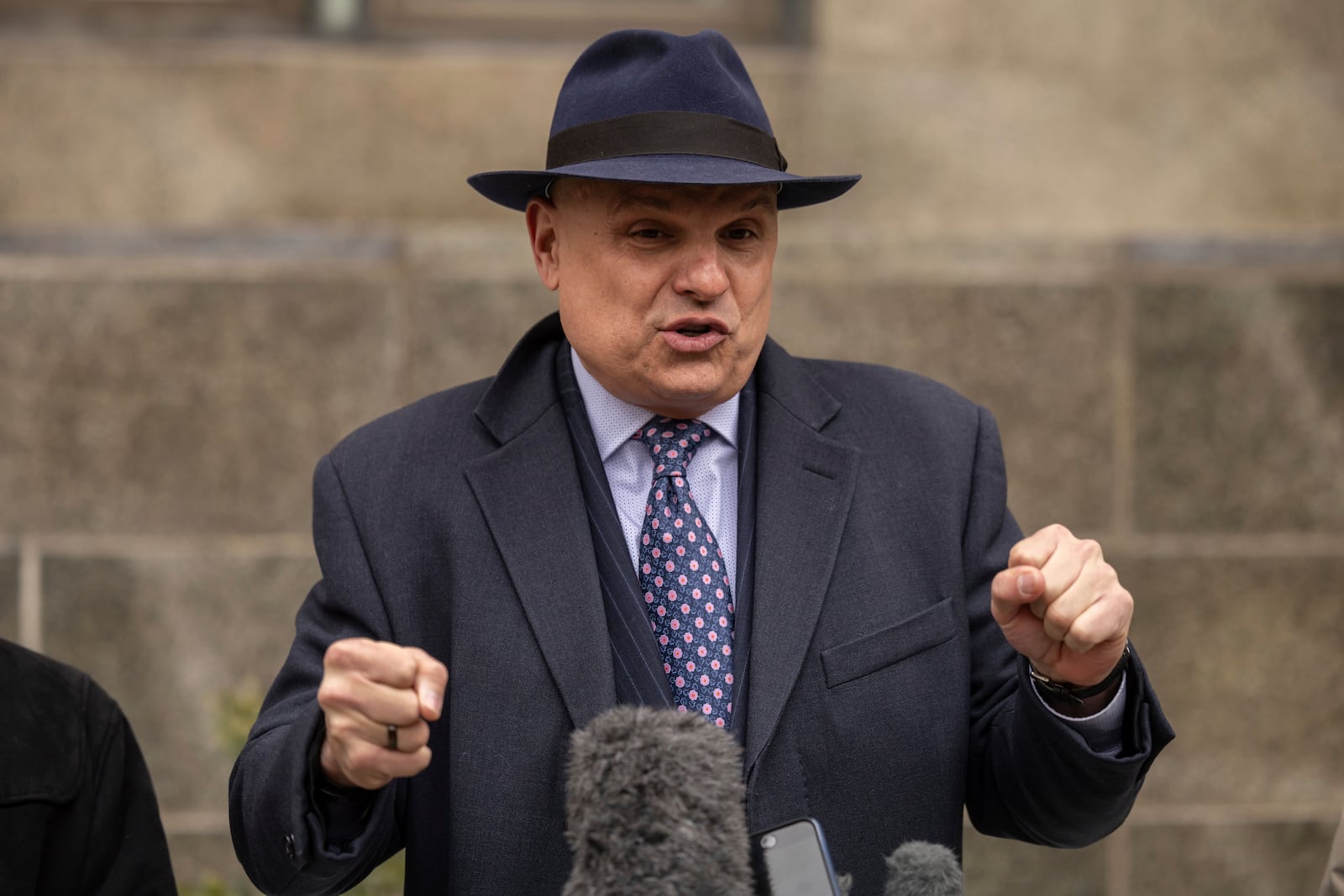 Arthur Aidala, attorney for Steve Bannon, speaks to the members of media outside court in New York, Tuesday, Feb. 11, 2025. (AP Photo/Yuki Iwamura)