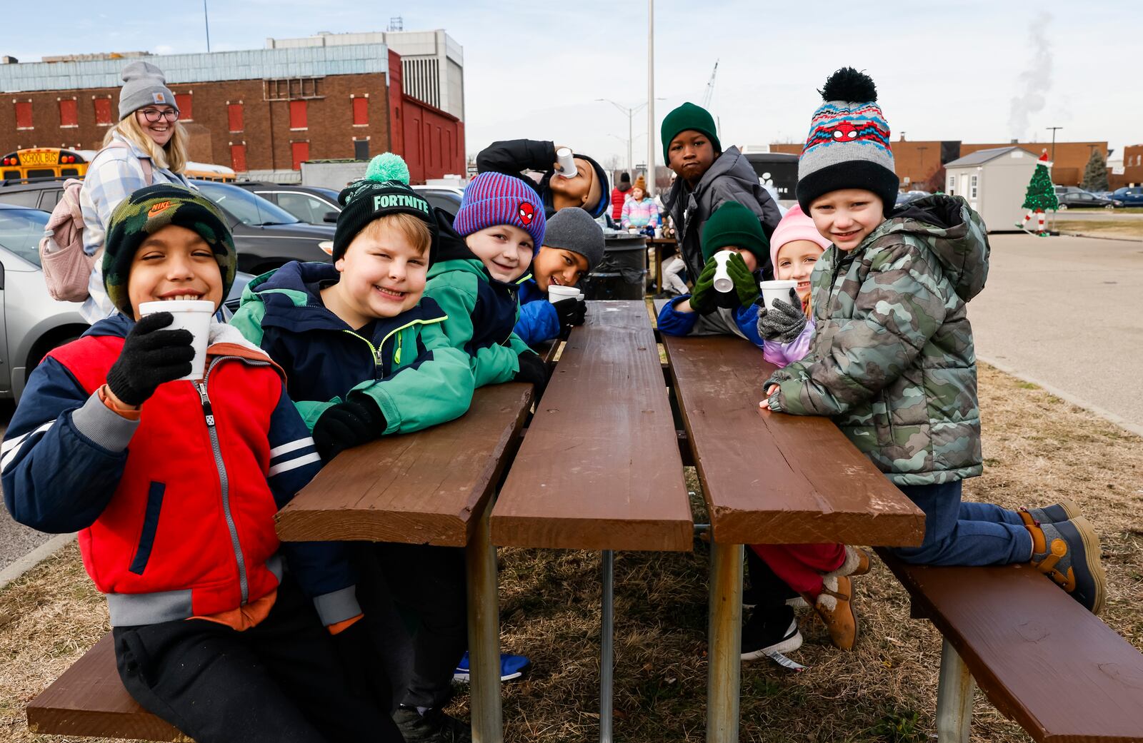 Creekview Elementary students drink hot chocolate before skating during an incentive field trip to the Middletown Holiday Whopla ice skating rink on Jan. 5, 2024 in downtown Middletown. NICK GRAHAM/STAFF