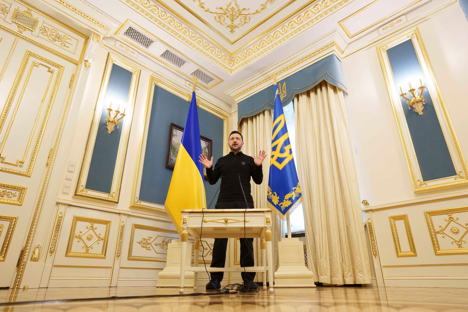 Ukrainian President Volodymyr Zelenskyy speaks to journalists during press conference in Kyiv, Ukraine, Wednesday, Feb. 26, 2025. (AP Photo/Evgeniy Maloletka)