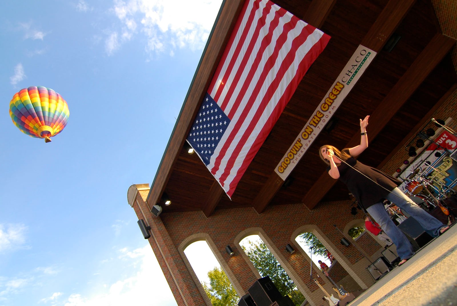 FILE PHOTO/2007: Ashley Brandenburg, the 2005 Fairfield Idol winner sings during the Red, White and Kaboom celebration Tuesday evening at Village Green in Fairfield, Ohio.  FILE PHOTO/NICK GRAHAM