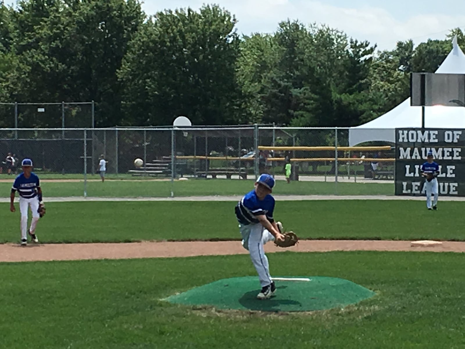 Hamilton West Side’s Ethan Mueller delivers a pitch Sunday during a 13-4 victory over Maumee in the Ohio Little League 12-year-old tournament at Ford Park in Maumee. RICK CASSANO/STAFF