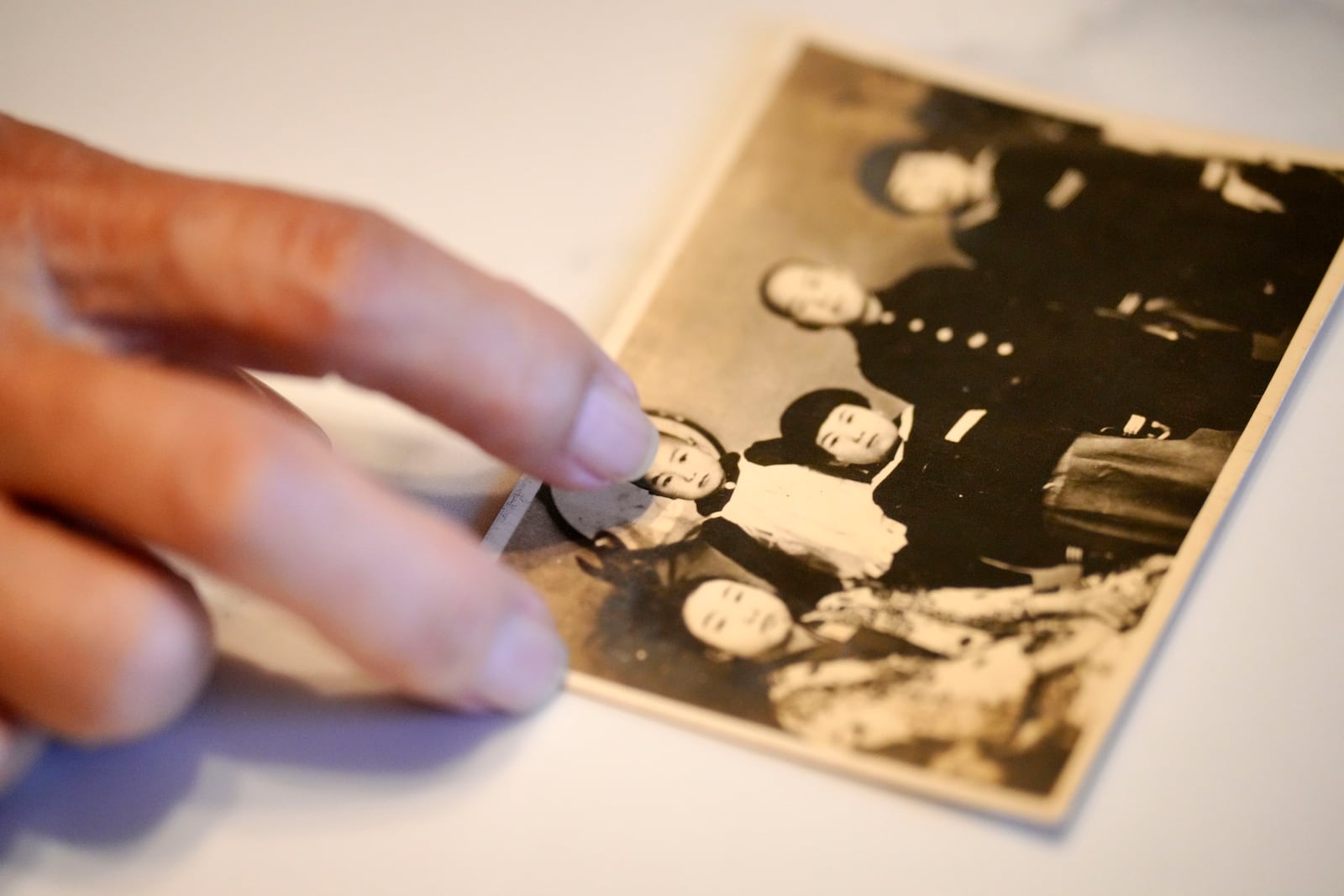 Hideko Hakamada, sister of Iwao Hakamada, shows a family photo during an interview with The Associated Press in Hamamatsu, Shizuoka prefecture, central Japan, Thursday, Oct. 17, 2024. (AP Photo/Eugene Hoshiko)