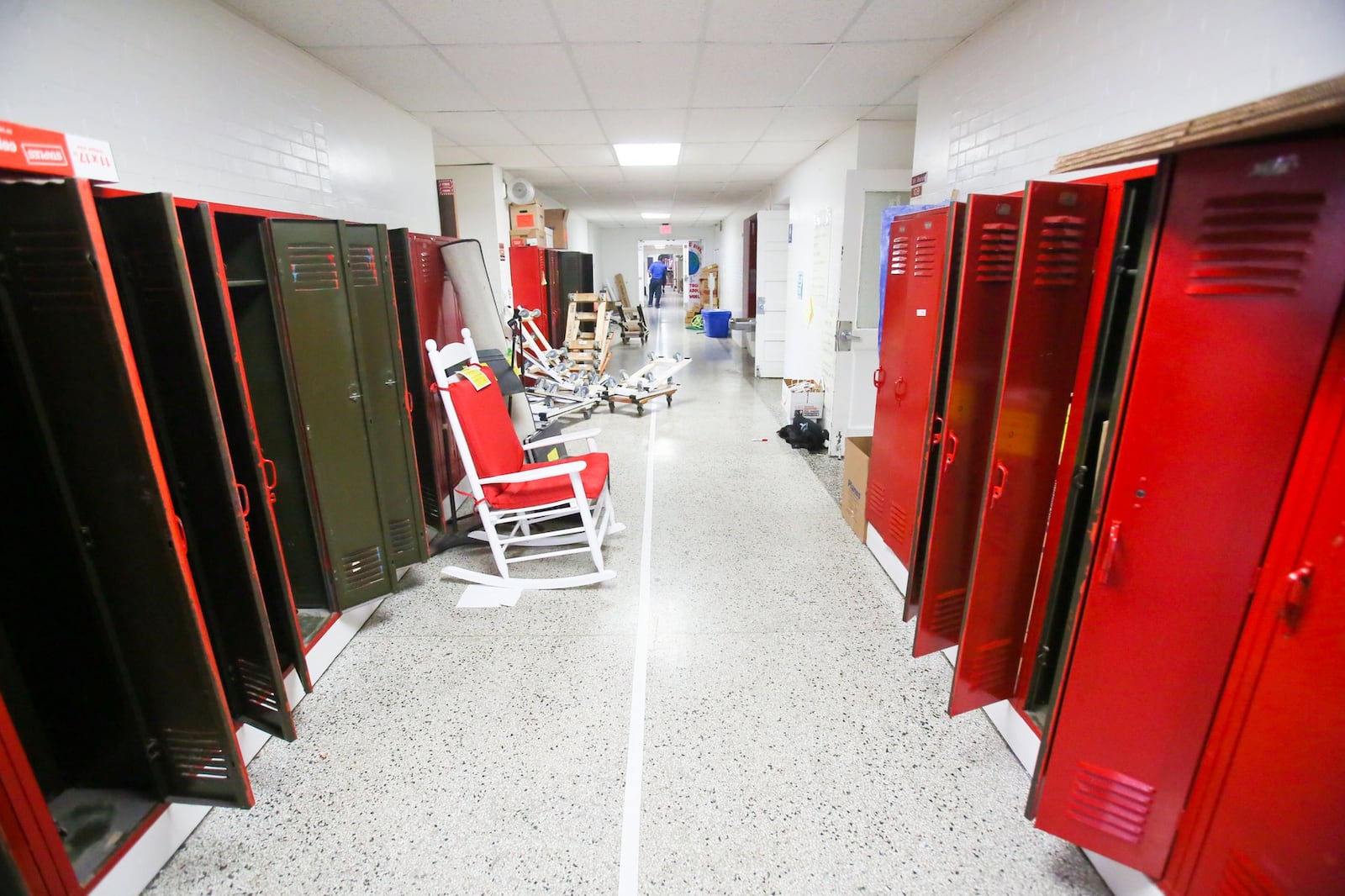 Crews from Planes Moving and Storage remove items from Fairfield Central Elementary on Tuesday, May 23. The building — Butler County’s second-oldest school — will be demolished in June. 