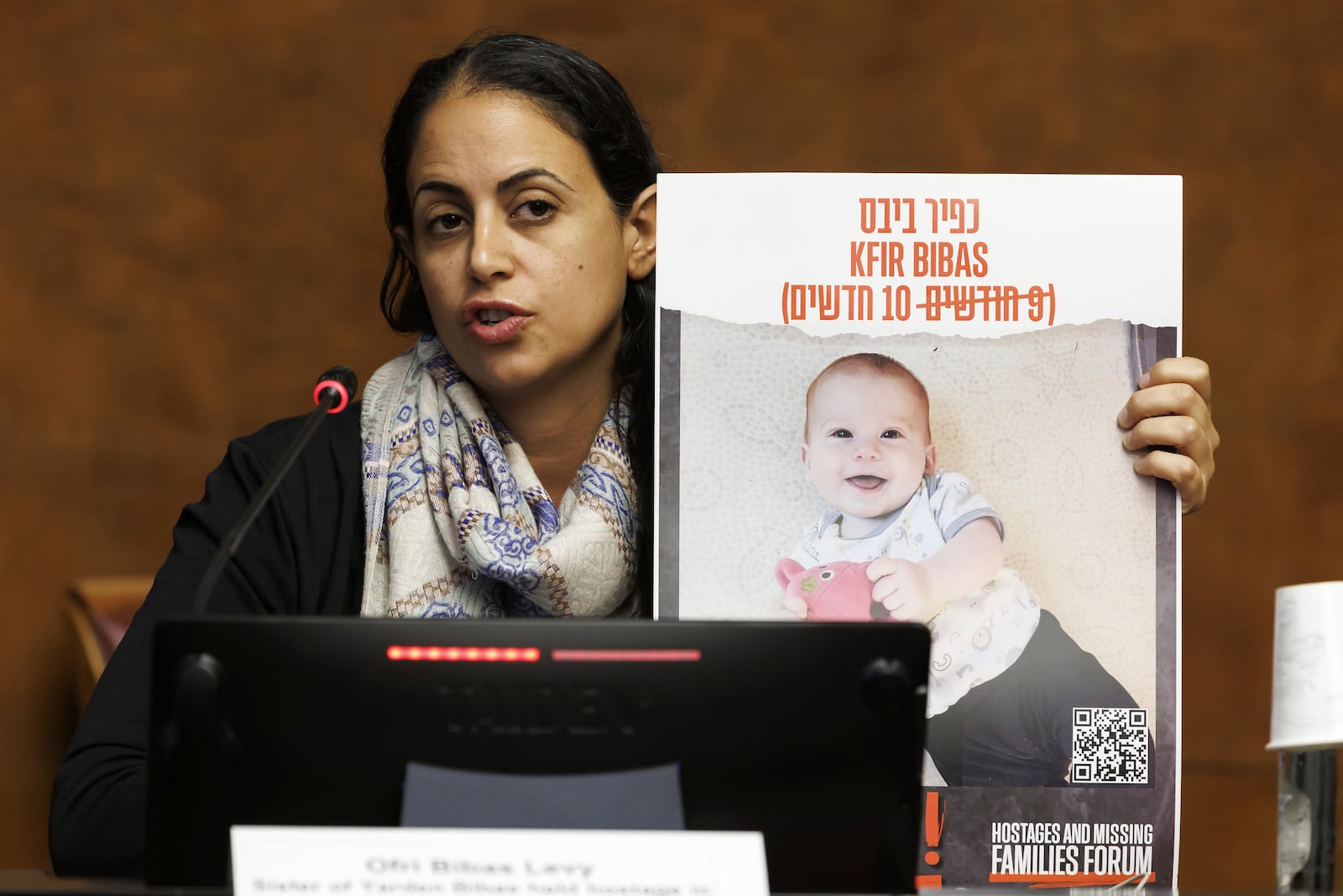 FILE - Ofri Bibas Levy talks to the media in Geneva, Switzerland, on Nov. 14, 2023, about her brother, Yarden Bibas, who is being held hostage in Gaza with his wife and two kids. (Salvatore Di Nolfi/Keystone via AP, File)