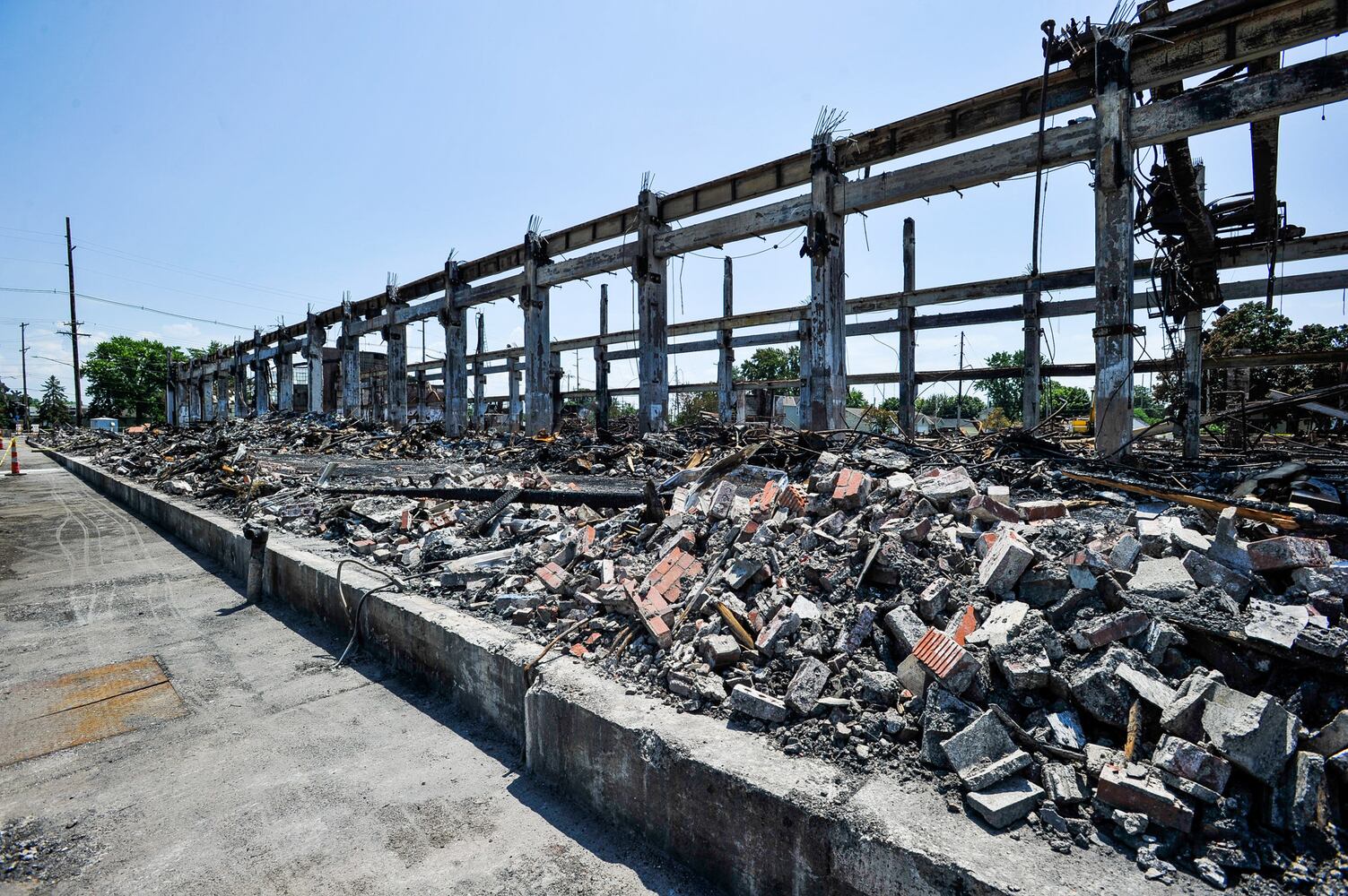 Crews demolish warehouse after massive fire in Hamilton