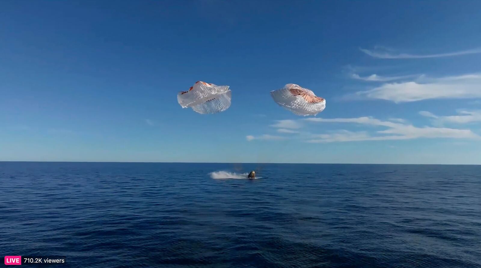 This image taken from video released by SpaceX shows a SpaceX capsule parachuting into the Gulf of Mexico, Tuesday, March 18, 2025. (SpaceX via AP)