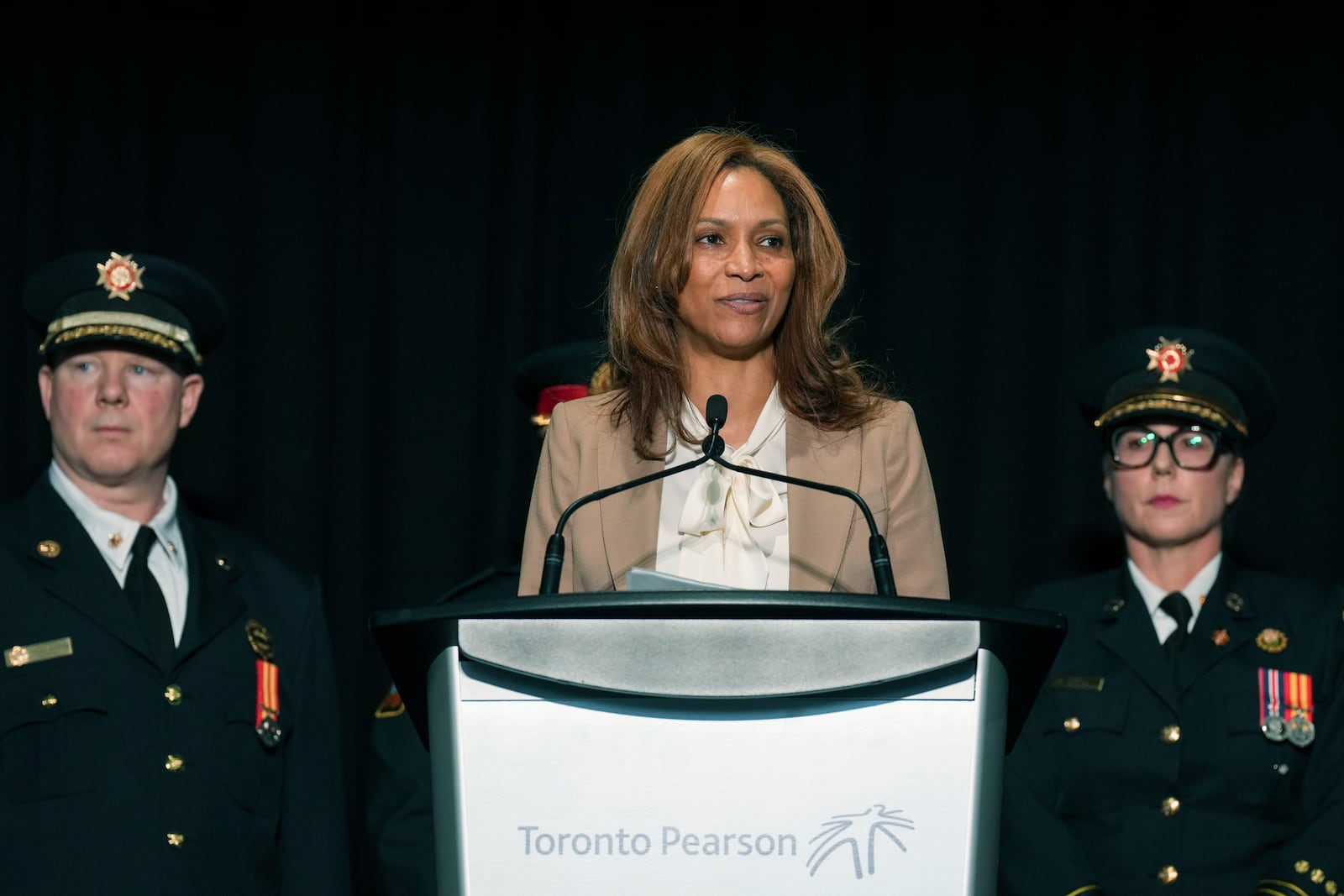 Deborah Flint, CEO of Greater Toronto Airports Authority, speaks to the media at Toronto Pearson Airport, Tuesday Feb. 18, 2025. (Chris Young/The Canadian Press via AP)