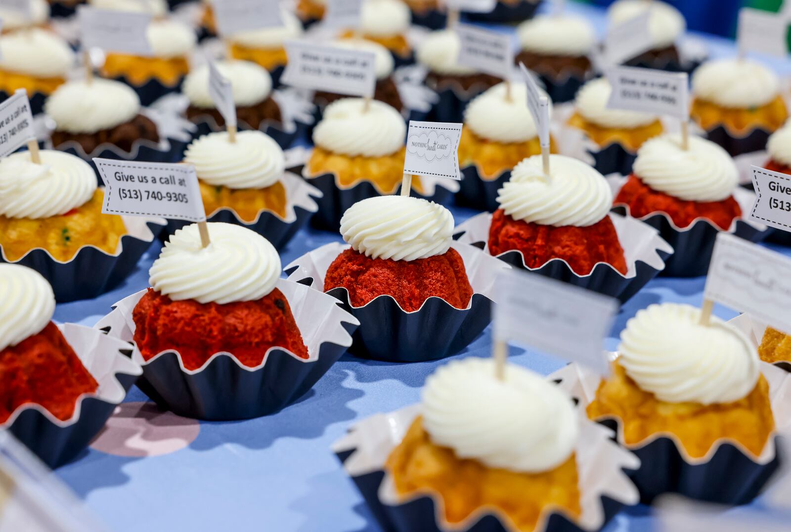 Local businesses and other attendees gathered at Lakota West High School for the West Chester Liberty Chamber alliance Regional Business Expo Tuesday, July 16, 2024 in West Chester Township. Nothing Bundt Cakes had cakes for attendees to sample. NICK GRAHAM/STAFF