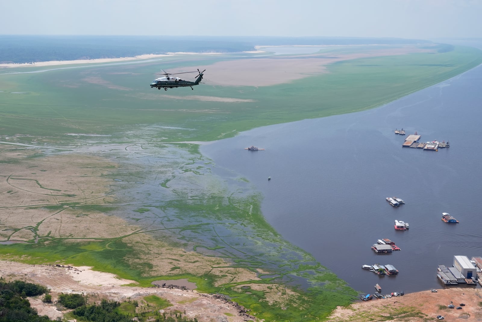 Marine One carrying President Joe Biden flies over the Amazon during a tour, Sunday, Nov. 17, 2024, in Manaus, Brazil. (AP Photo/Manuel Balce Ceneta)