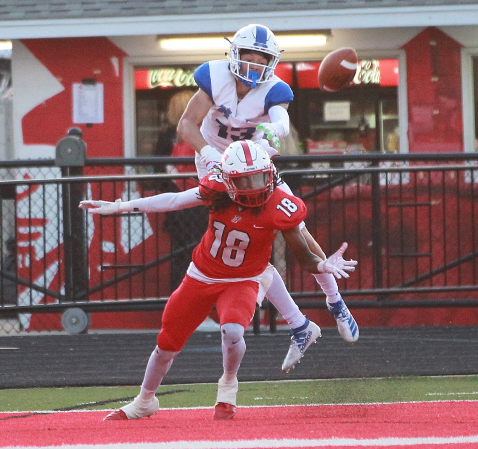 Daryan Bowling of Hamilton (top) battles Jaylen Goins for a pass. Fairfield defeated visiting Hamilton 34-27 in a Week 4 high school football game on Friday, Sept. 20, 2019. MARC PENDLETON / STAFF