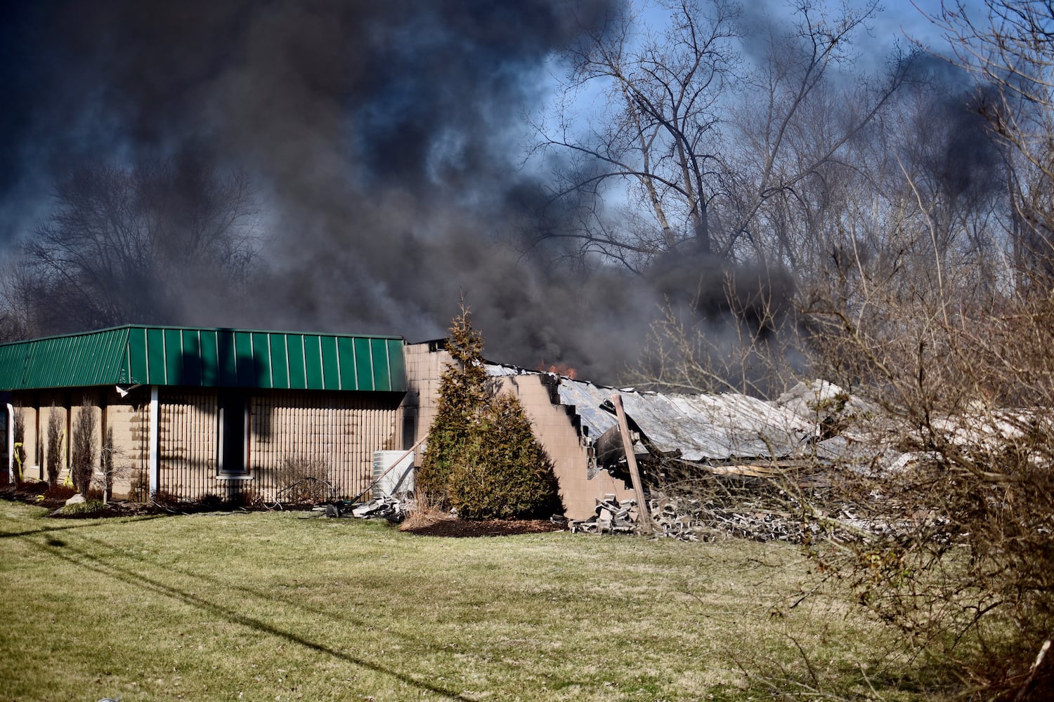 PHOTOS Massive fire at Wholesale Tire Mart in Morgan Township