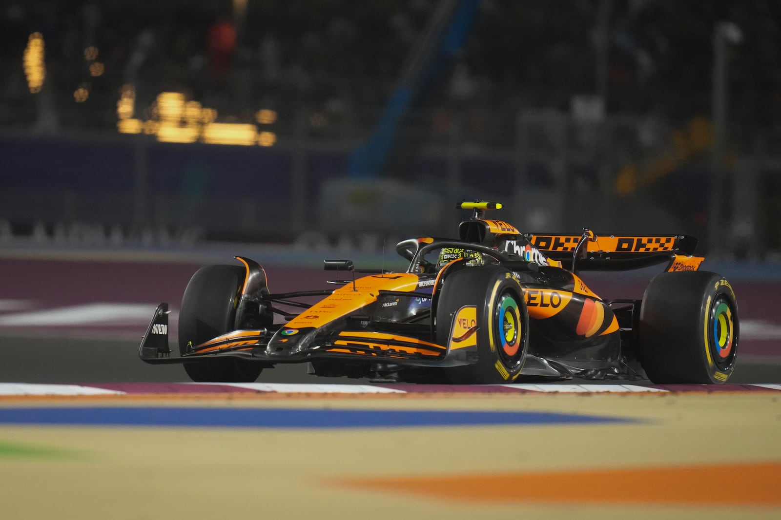 McLaren driver Lando Norris of Britain in action during the Qatar Formula One Grand Prix at the Lusail International Circuit in Lusail, Qatar, Sunday, Dec. 1, 2024. (AP Photo/Darko Bandic)