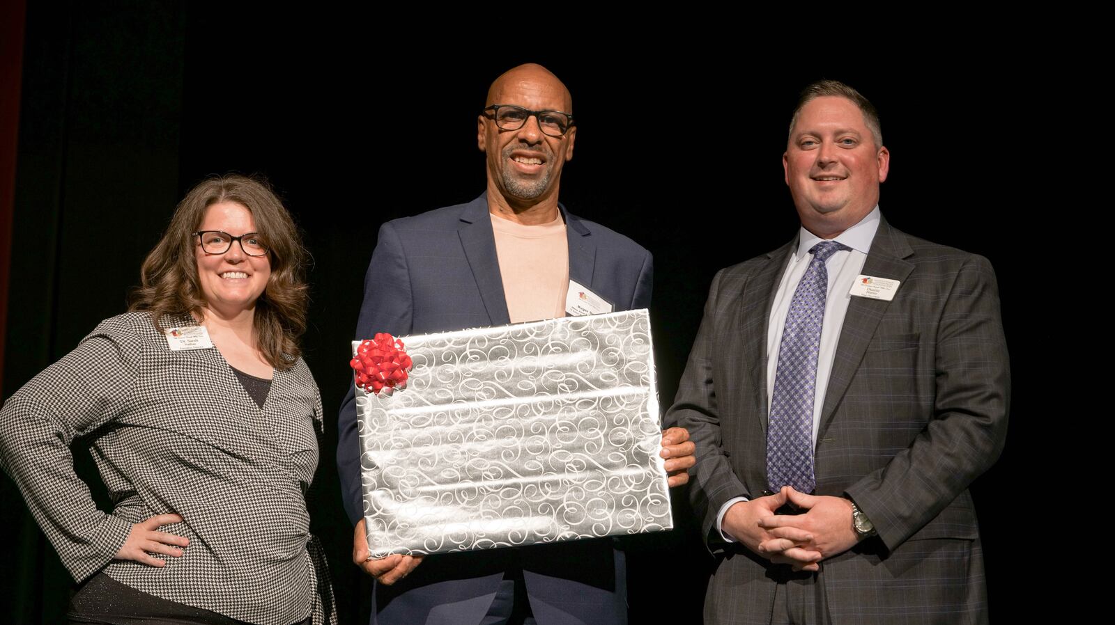 Roger Smith, center, was presented the Mary Jane Palmer-Nunlist “I Love Middletown” Award during the recent Middletown Community Foundation annual awards. On left is Sara Nathan, executive director of the MCF, and on right is Dustin Hurley, incoming board president. SUBMITTED PHOTO