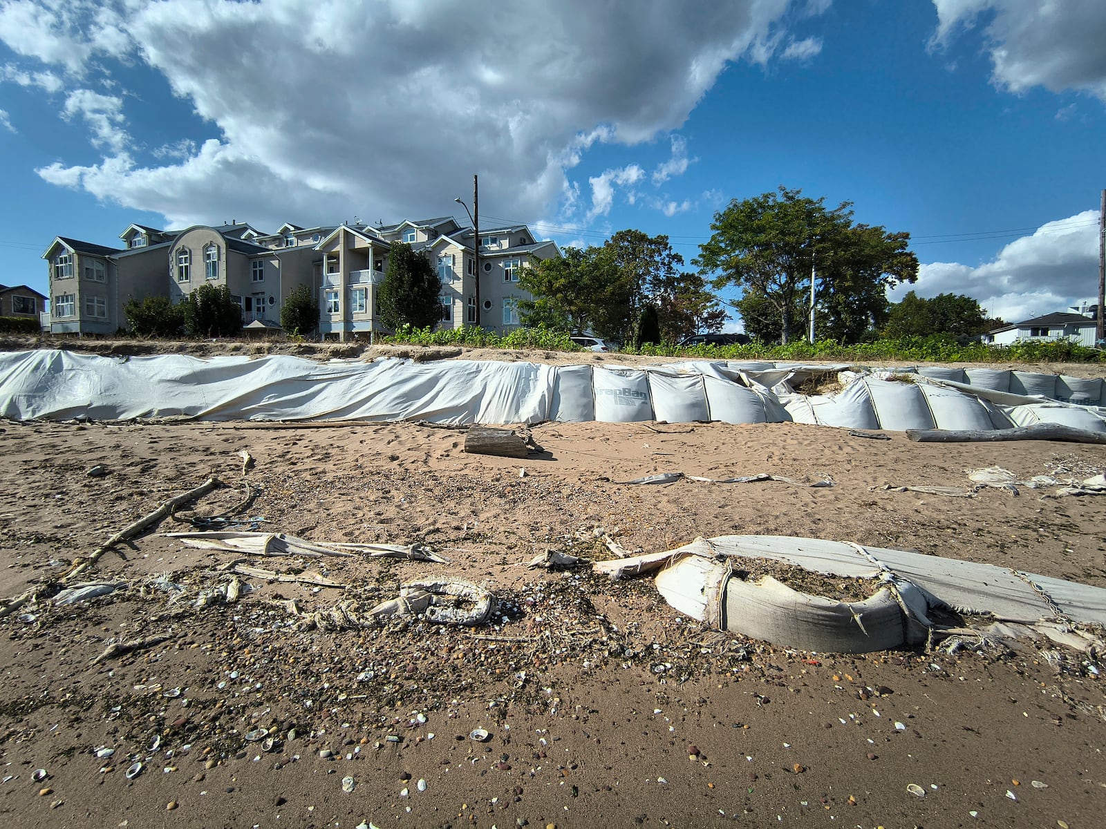 Sandbags installed after Hurricane Sandy can be seen after more than a decade of erosion Wednesday, Oct. 9, 2024, at a beach near Tottenville, Staten Island, at the southernmost tip of New York City. (AP Photo/Cedar Attanasio)