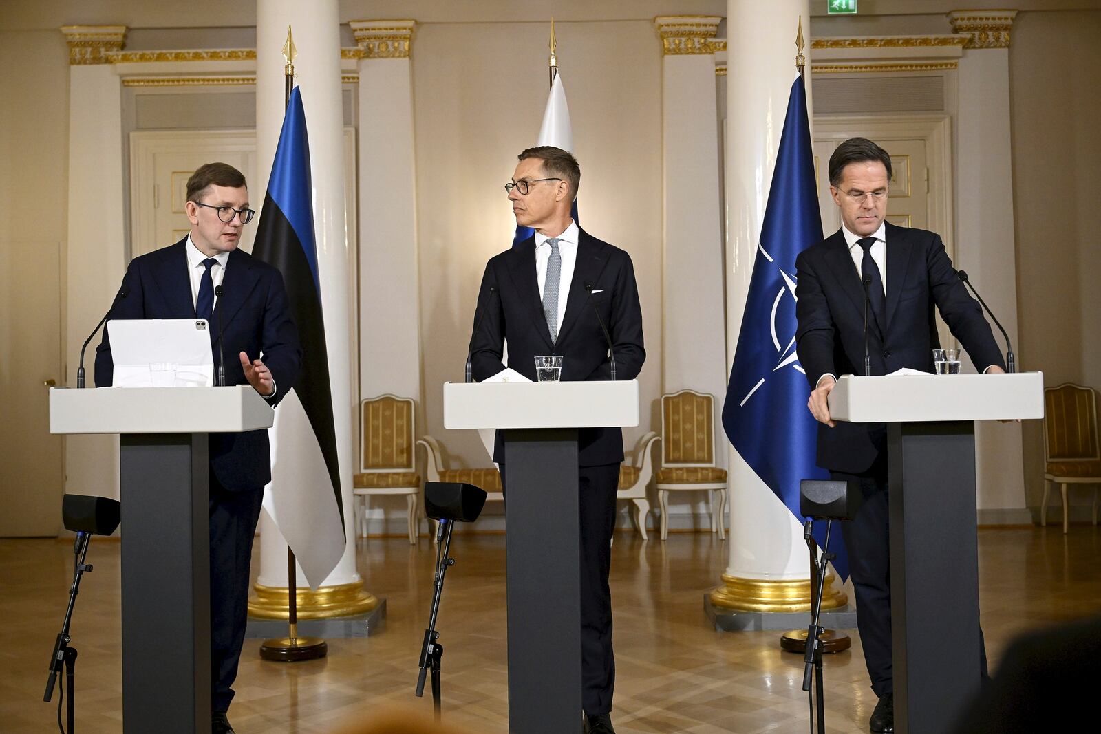 From left, Estonian Prime Minister Kristen Michal, Finnish President Alexander Stubb and Nato's Secretary General Mark Rutte address the media during a joint press conference as part of a summit of the Baltic Sea NATO countries in Helsinki, Finland, Tuesday, Jan. 14, 2025. (Antti Aimo-Koivisto/Lehtikuva via AP)