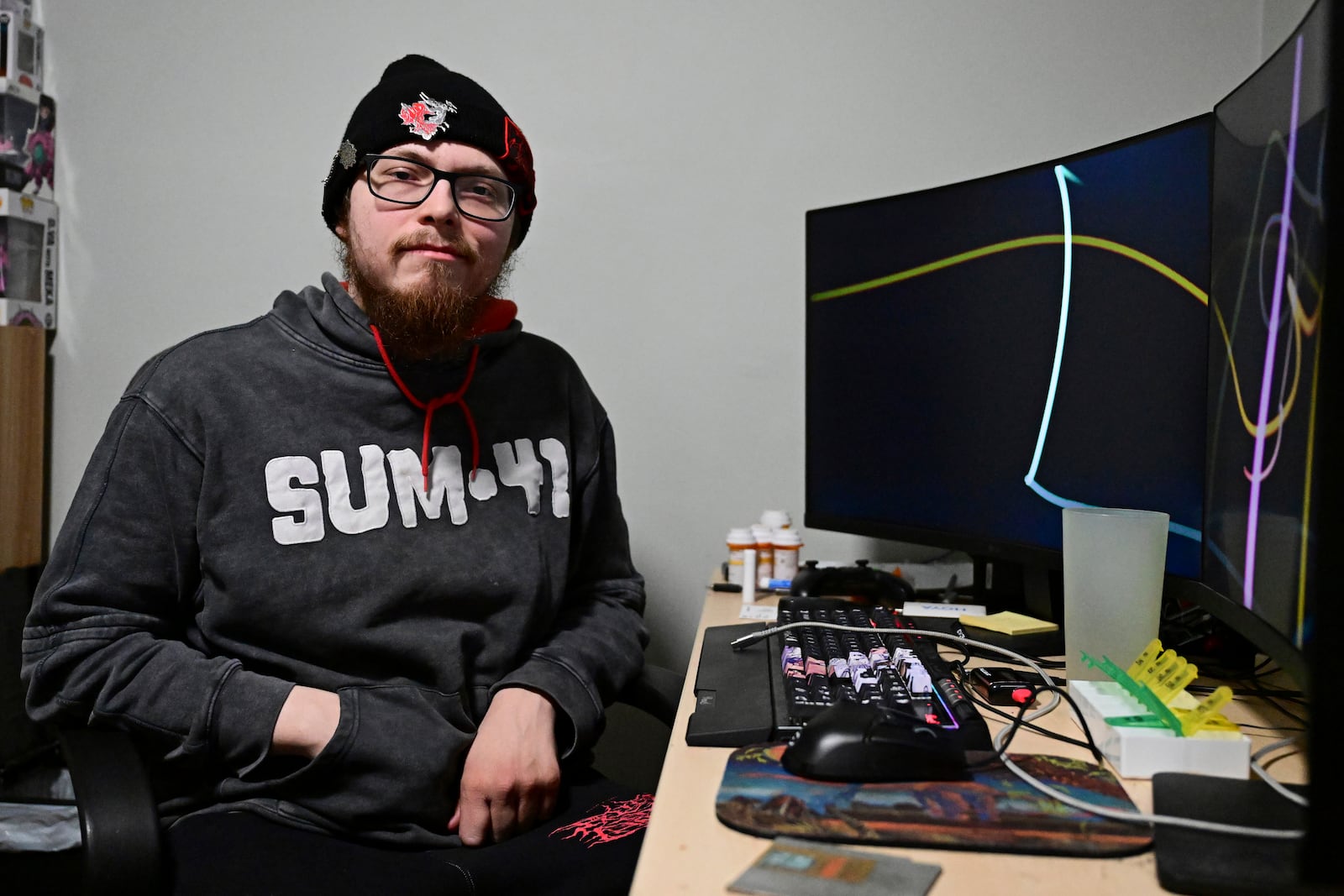 Nicholas Fontaine poses for a portrait inside his home in Akron, Ohio, Tuesday, Dec. 3, 2024. Fontaine is charged with one count of illegal voting. (AP Photo/David Dermer)