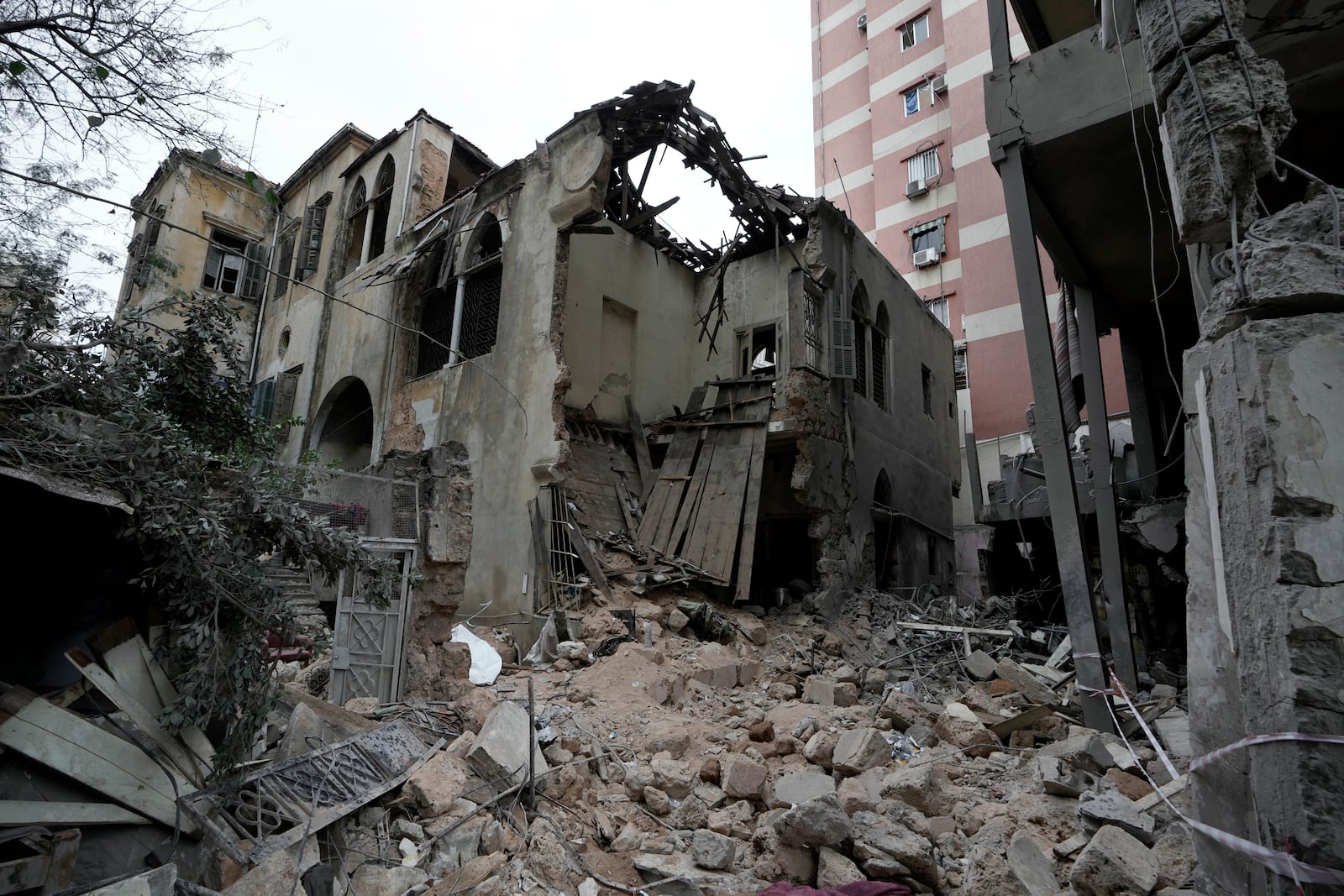 A destroyed building hit on Monday evening by an Israeli airstrike is seen in central Beirut, Lebanon, Tuesday, Nov. 19, 2024. (AP Photo/Bilal Hussein)