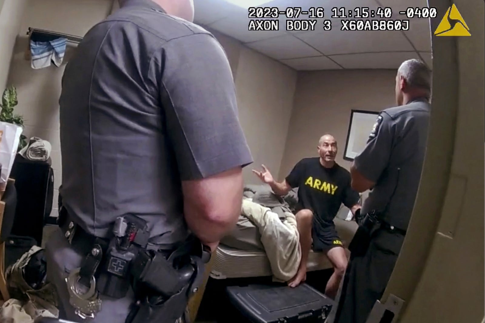 FILE — In this image taken from New York State Police body camera video that was obtained by WMTW-TV 8 in Portland, Maine, New York State Police interview Army reservist Robert Card, the man responsible for Maine's deadliest mass shooting, at Camp Smith, in Cortlandt, N.Y., July 16, 2023. (WMTW-TV 8/New York State Police via AP, File)