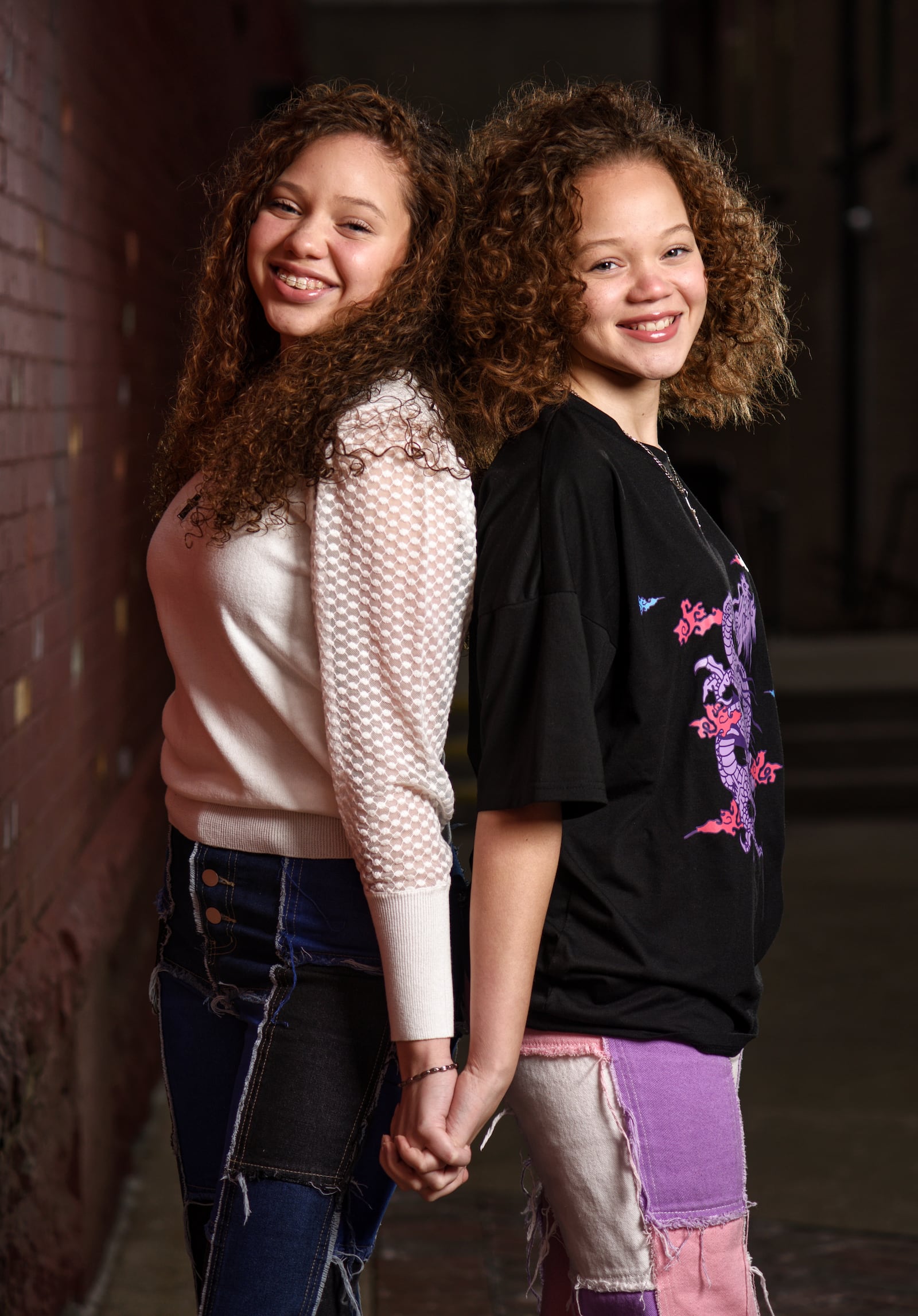 The Cunningham sisters, Macie, 15, left, and Marie, 13, have been singing on social media trying to spread a positive message and recently sent an audition video to the television show The Voice. NICK GRAHAM / STAFF