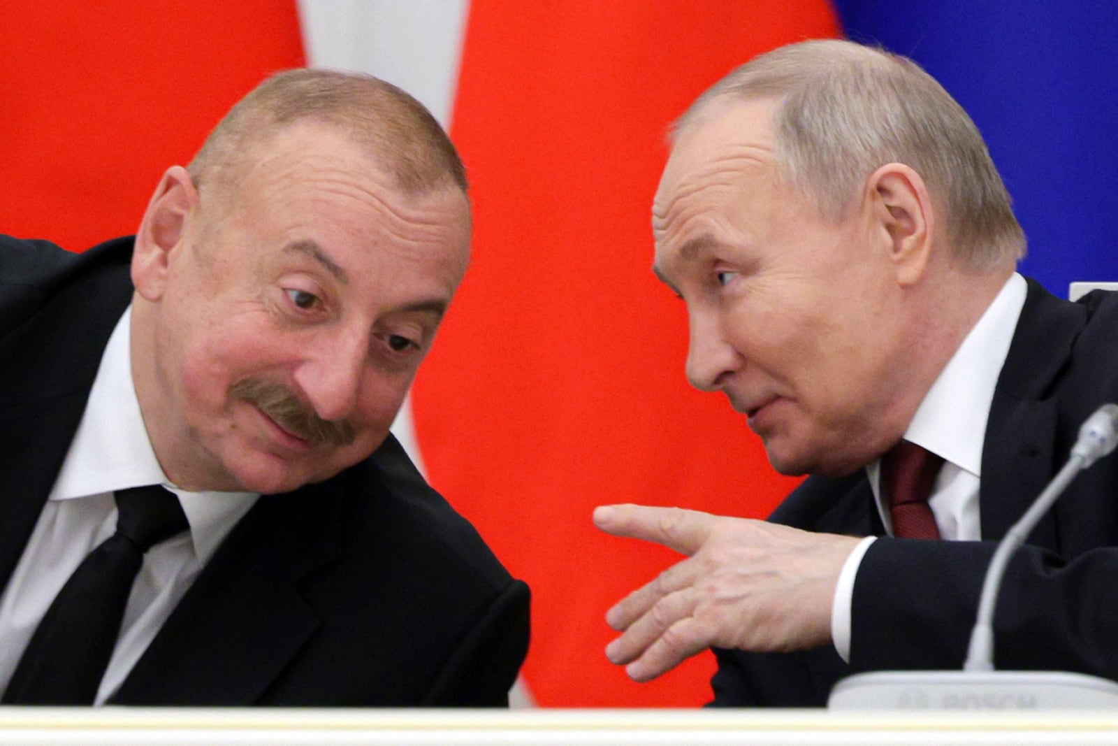 FILE - Russian President Vladimir Putin, right, and Azerbaijani President Ilham Aliyev attend a meeting with railway industry veterans and workers to mark the 50th anniversary of the Baikal-Amur Mainline (BAM) construction at the Kremlin in Moscow, Russia, Monday, April 22, 2024. (Gavriil Grigorov, Sputnik, Kremlin Pool Photo via AP, File)