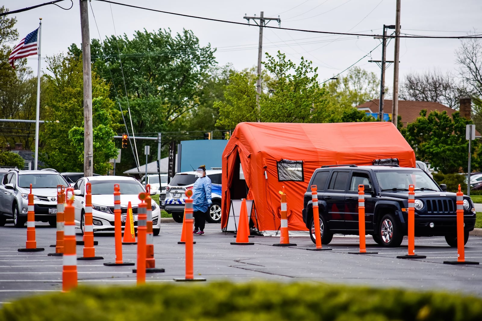 Cars line up for COVID-19 testing Tuesday, May 5, 2020 at Fort Hamilton Hospital in Hamilton. NICK GRAHAM / STAFF