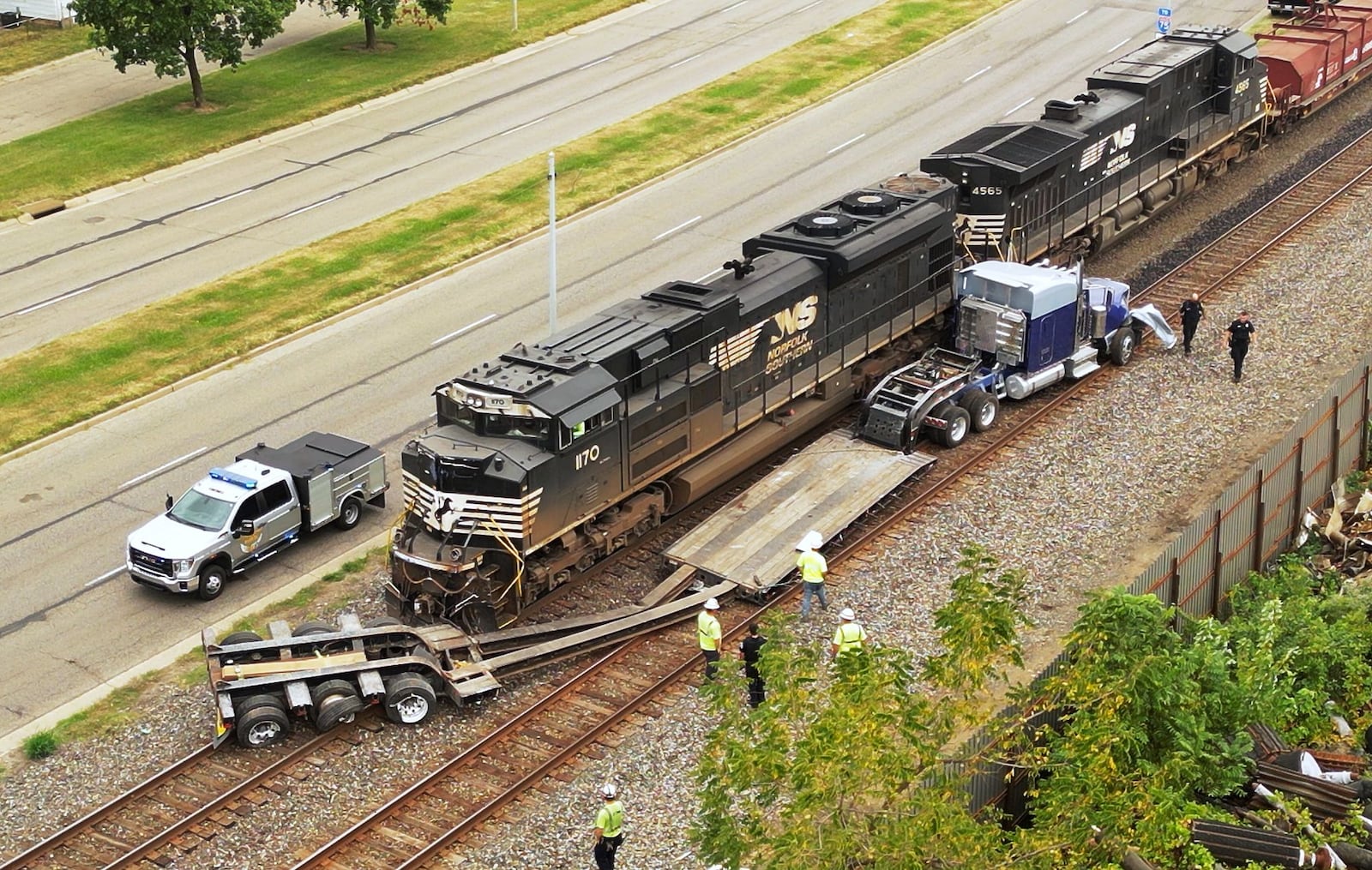 A semi tractor trailer was struck by a train on tracks at a crossing at  at Woodlawn Avenue and University Boulevard in Middletown Sept. 7, 2023. No one was injured. NICK GRAHAM/STAFF