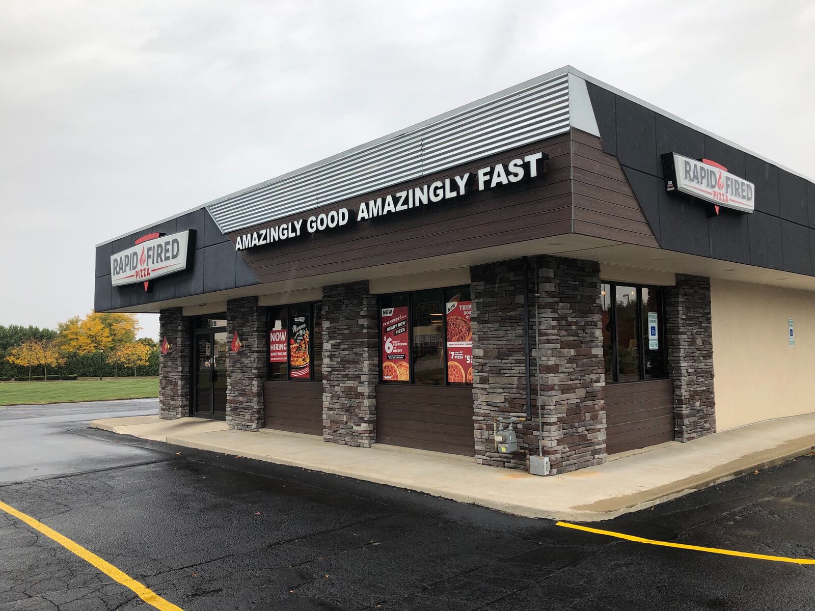 Wiley's Wings Tenders Fries will open soon at this location that currently houses a Rapid Fired Pizza restaurant on Brandt Pike in Huber Heights. MARK FISHER/STAFF