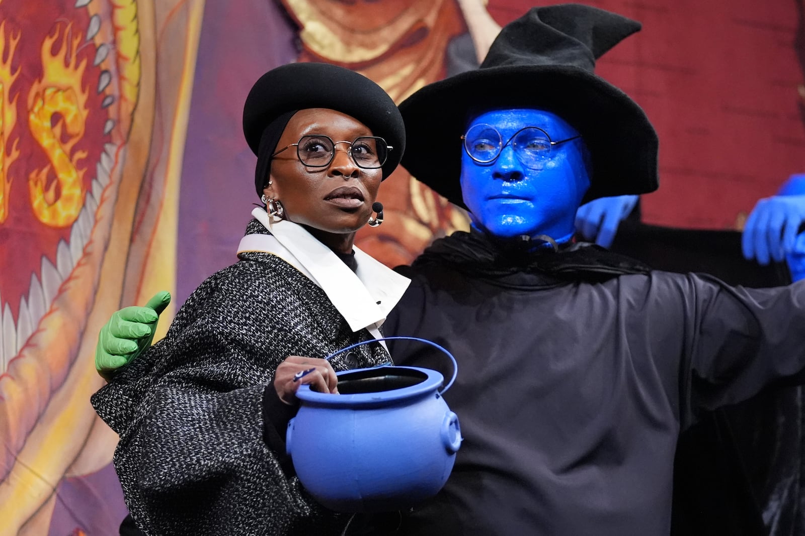 Harvard University's Hasty Pudding Theatricals Woman of the Year Cynthia Erivo, left, stands with a character actor during a roast, Wednesday, Feb. 5, 2025, in Cambridge, Mass. (AP Photo/Charles Krupa)