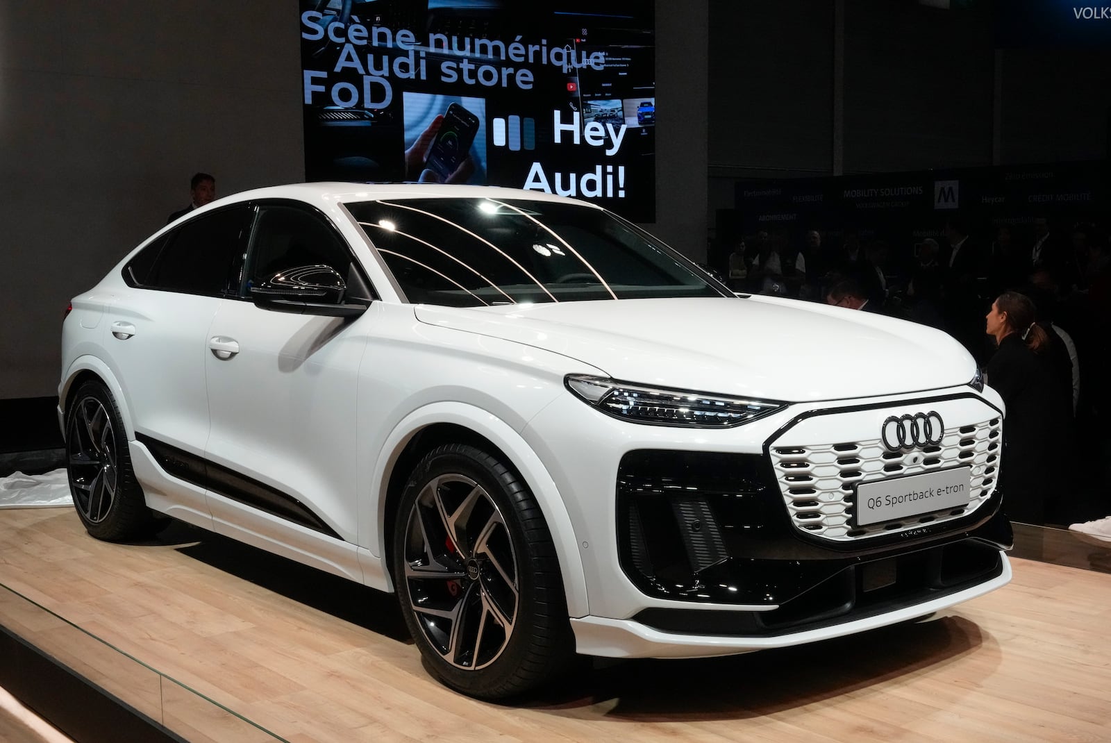 Audi unveils the world premiere Q6 Sportback e-tron car at the Paris Auto Show, in Paris, Monday, Oct. 14, 2024. (AP Photo/Michel Euler)