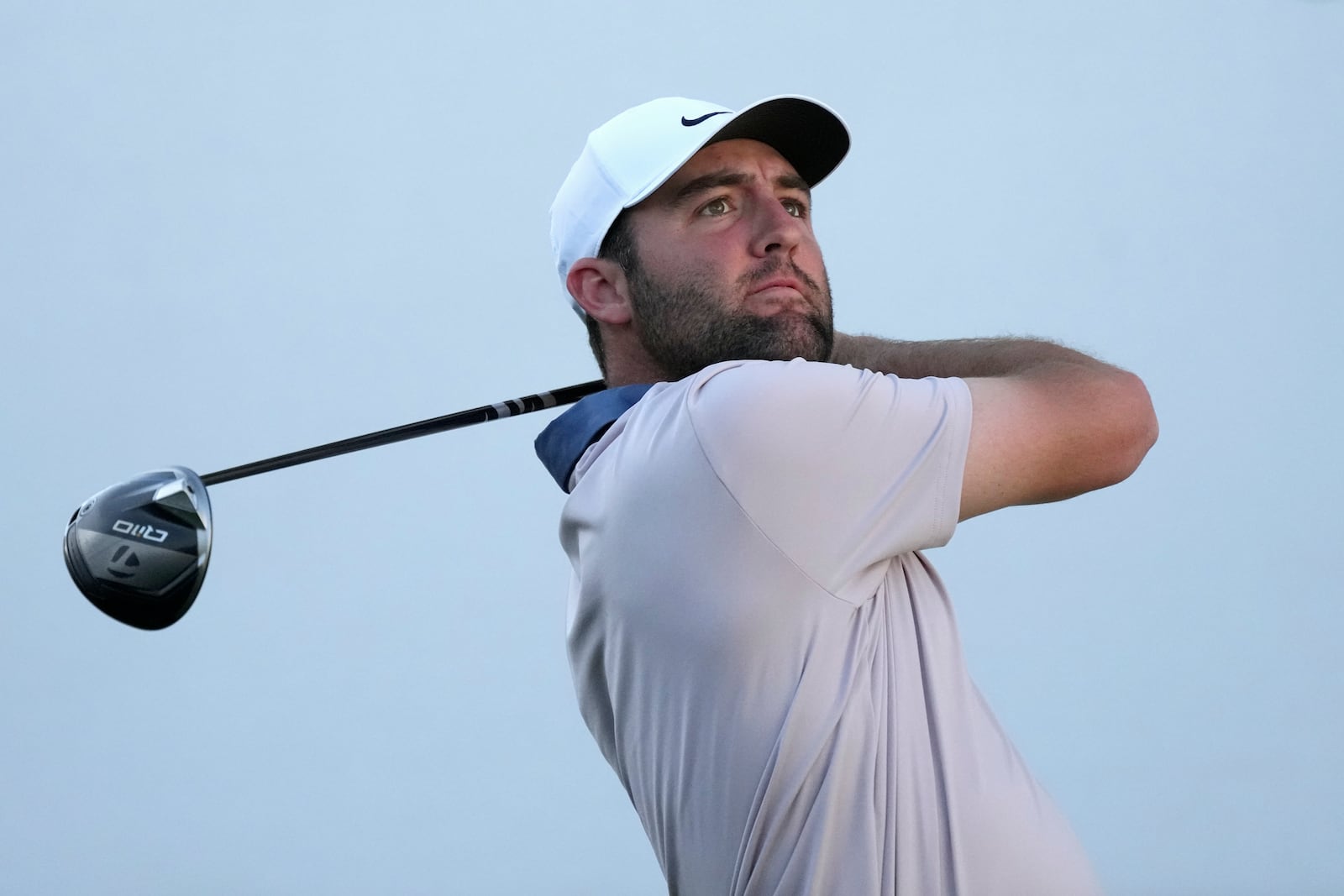 Scottie Scheffler hits his tee shot at the 16th hole during the first round of the Waste Management Phoenix Open PGA Tour golf tournament at the TPC Scottsdale Thursday, Feb. 6, 2025, in Scottsdale, Ariz. (AP Photo/Ross D. Franklin)