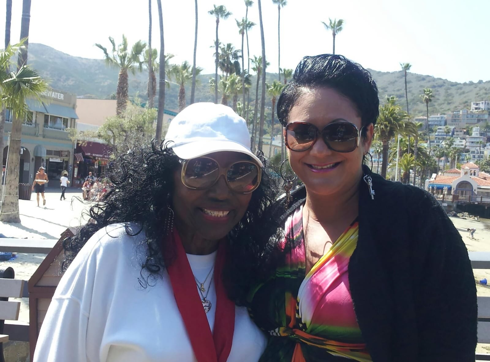 This undated image provided by Dalyce Kelley shows her with her grandmother, Dalyce Curry, left, in Catalina, Calif. (Dalyce Kelley via AP)