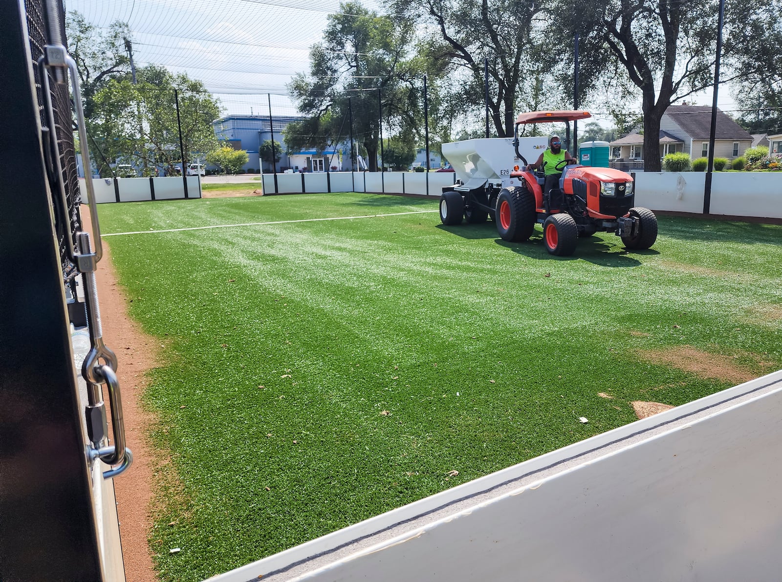 A crew with Motz Group works on a installing a miniature turf soccer field at Douglass Park Wednesday, Aug. 23, 2023 in Middletown. NICK GRAHAM/STAFF