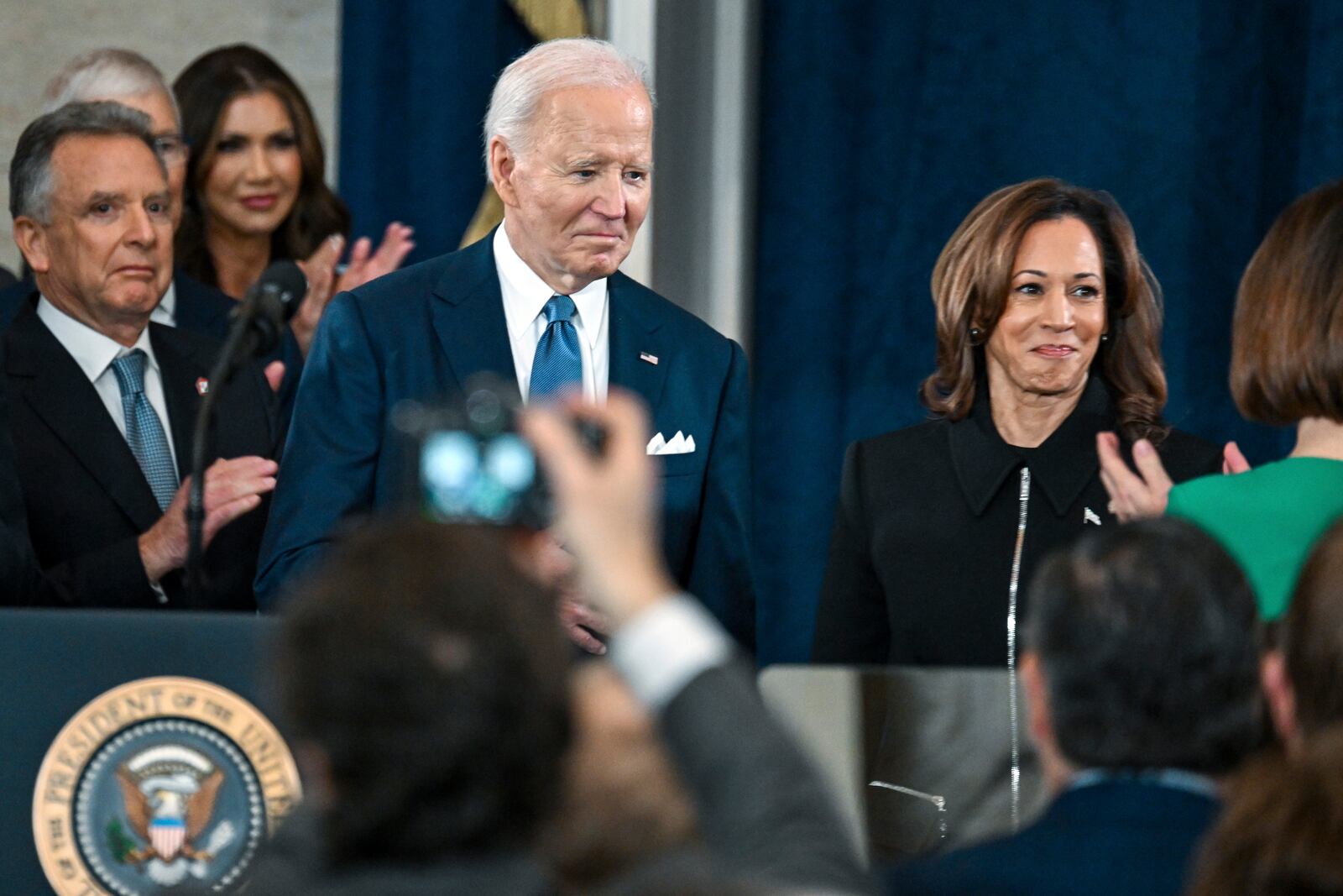 President Joe Biden, left, and Vice President Kamala Harris arrive for the 60th Presidential Inauguration in the Rotunda of the U.S. Capitol in Washington, Monday, Jan. 20, 2025. (Kenny Holston/The New York Times via AP, Pool)