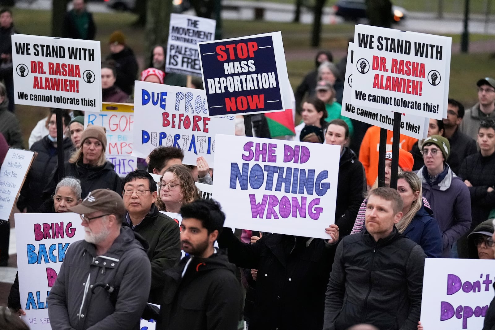 Protesters rally outside the Rhode Island State House in support of deported Brown University Dr. Rasha Alawieh, Monday, March 17, 2025, in Providence, R.I. (AP Photo/Charles Krupa)